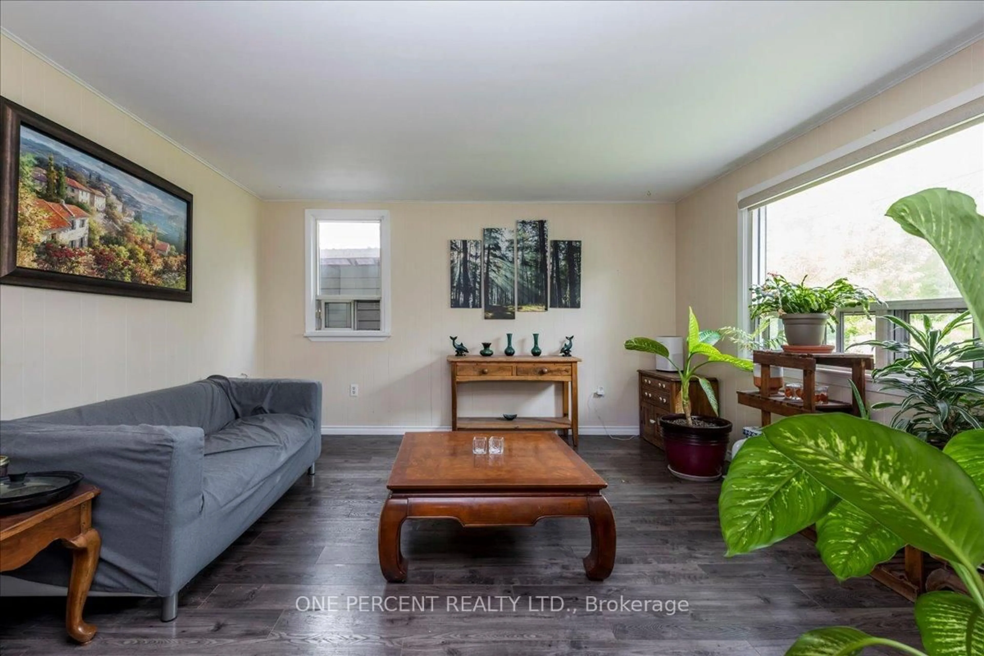 Living room with furniture, wood/laminate floor for 224 Foster Dr, Barrie Ontario L4N 3X8