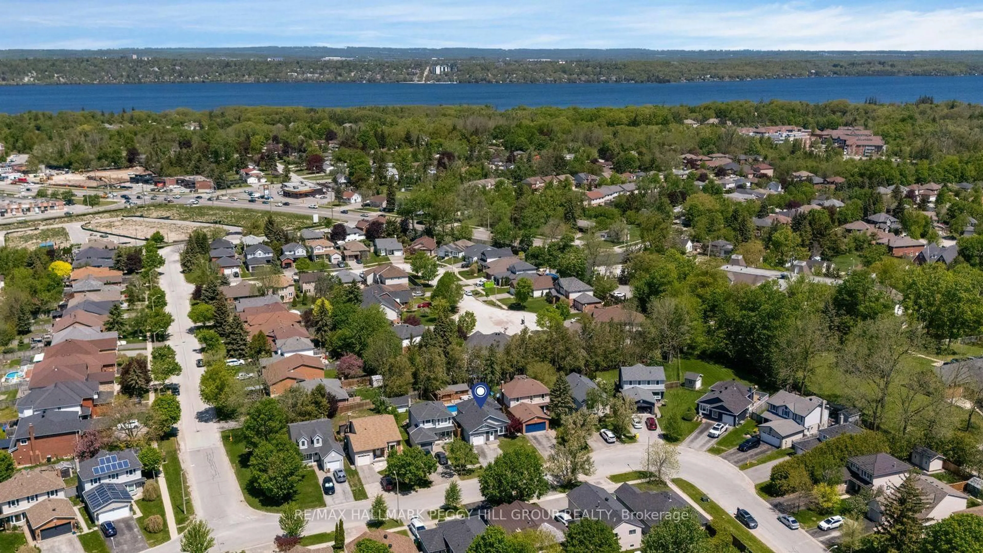 A pic from outside/outdoor area/front of a property/back of a property/a pic from drone, water/lake/river/ocean view for 44 Knicely Rd, Barrie Ontario L4N 6V3