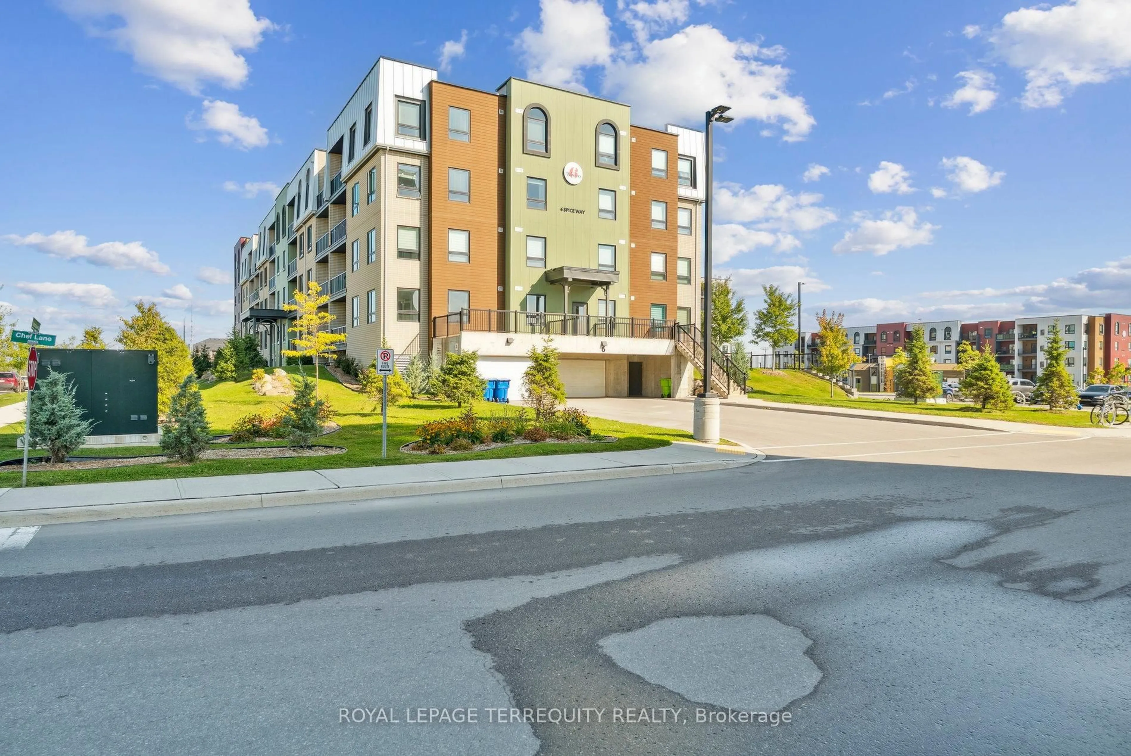 A pic from outside/outdoor area/front of a property/back of a property/a pic from drone, street for 6 Spice Way #102, Barrie Ontario L9J 0J9