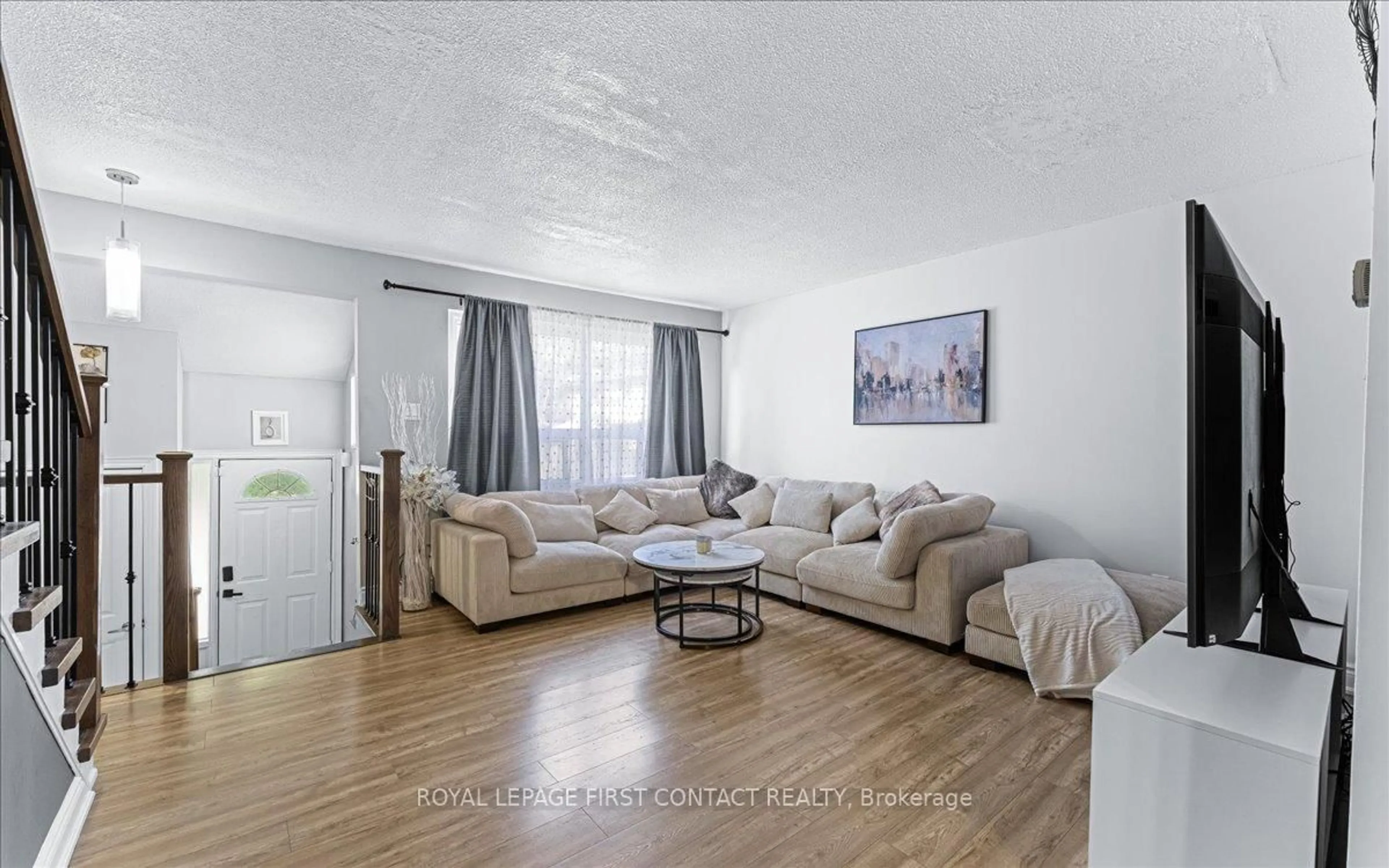 Living room with furniture, unknown for 63 Ferris Lane #I7, Barrie Ontario L4M 5C4