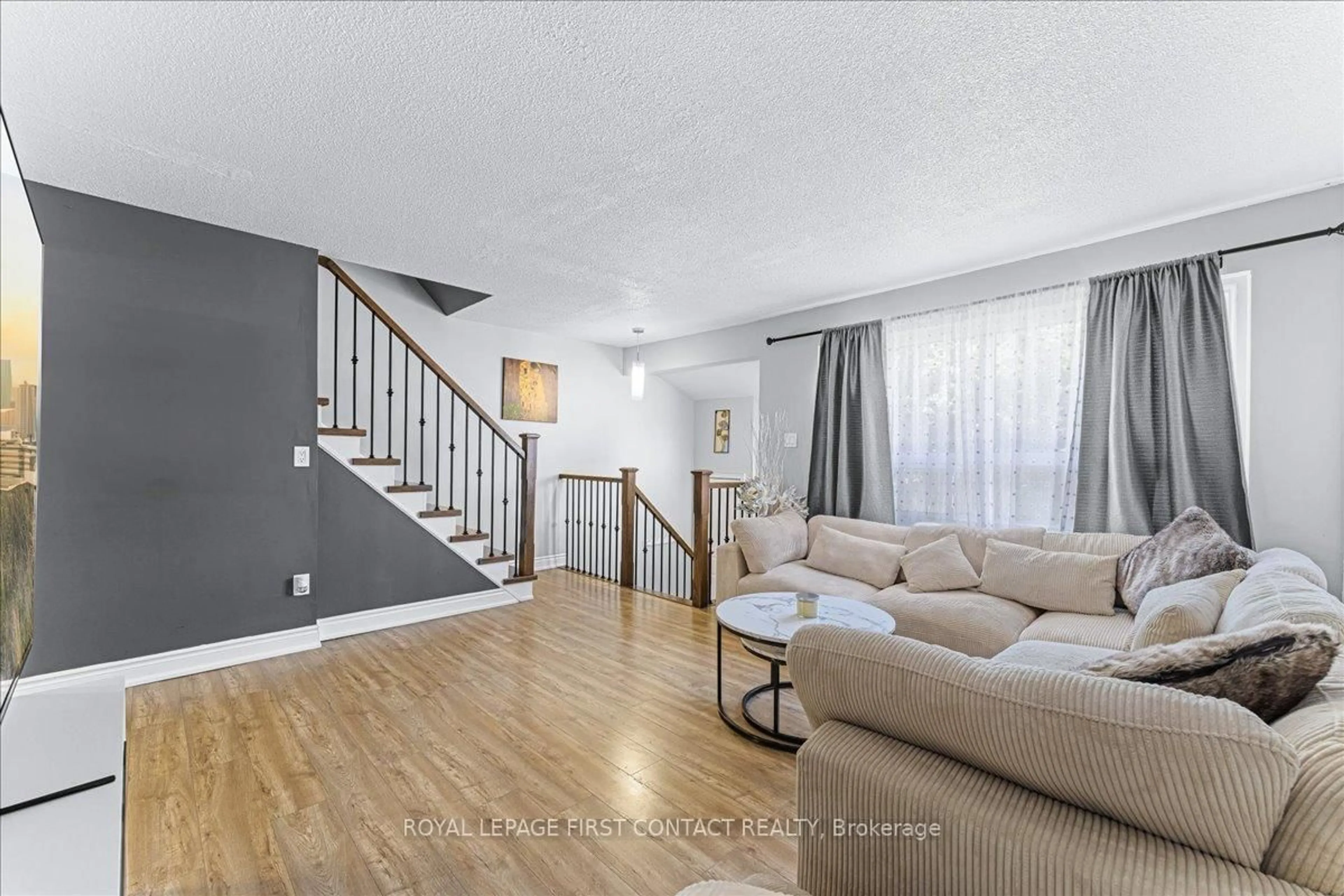 Living room with furniture, unknown for 63 Ferris Lane #I7, Barrie Ontario L4M 5C4