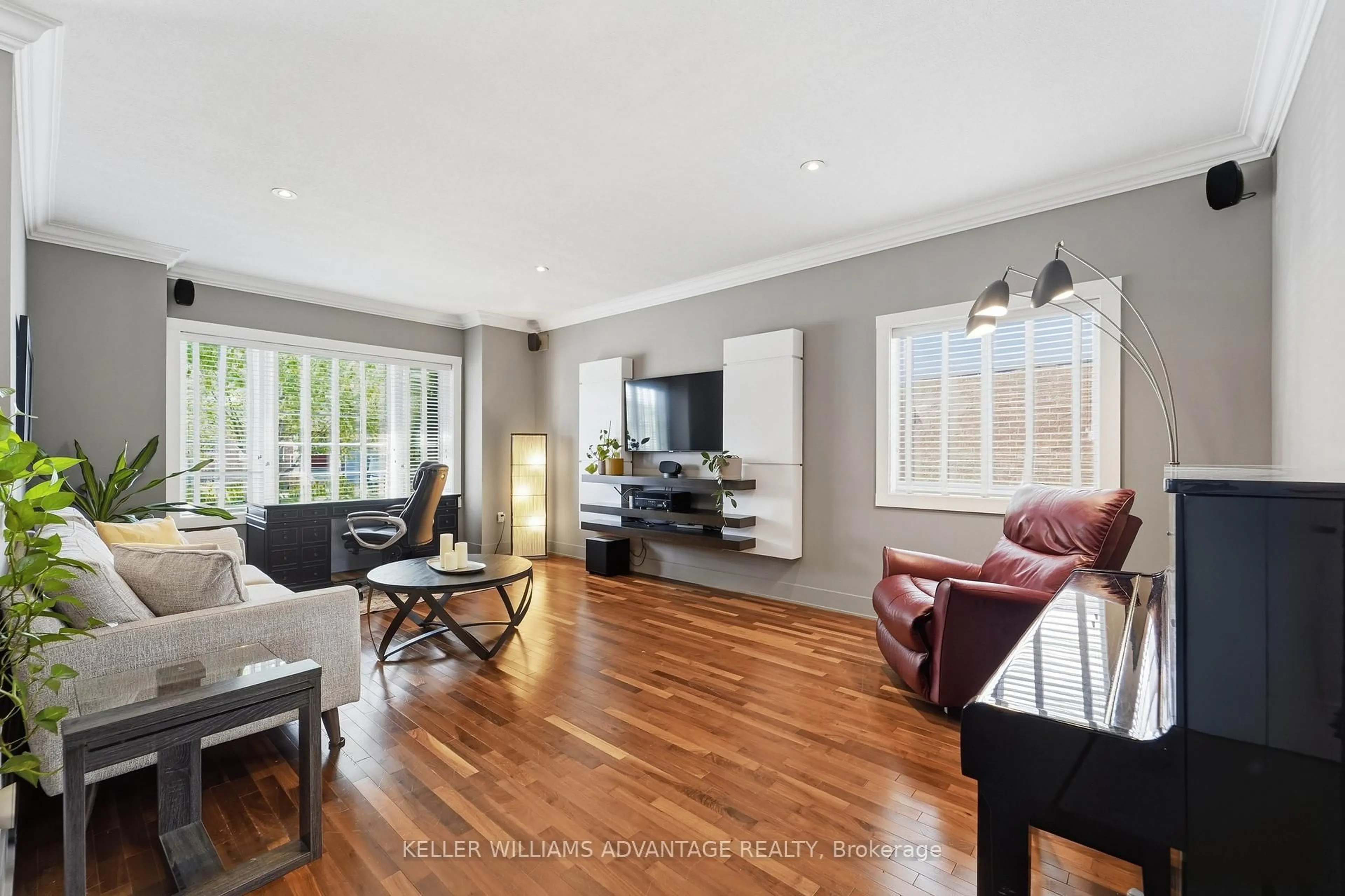 Living room with furniture, wood/laminate floor for 4 Cranberry Lane, Barrie Ontario L4N 0Z1