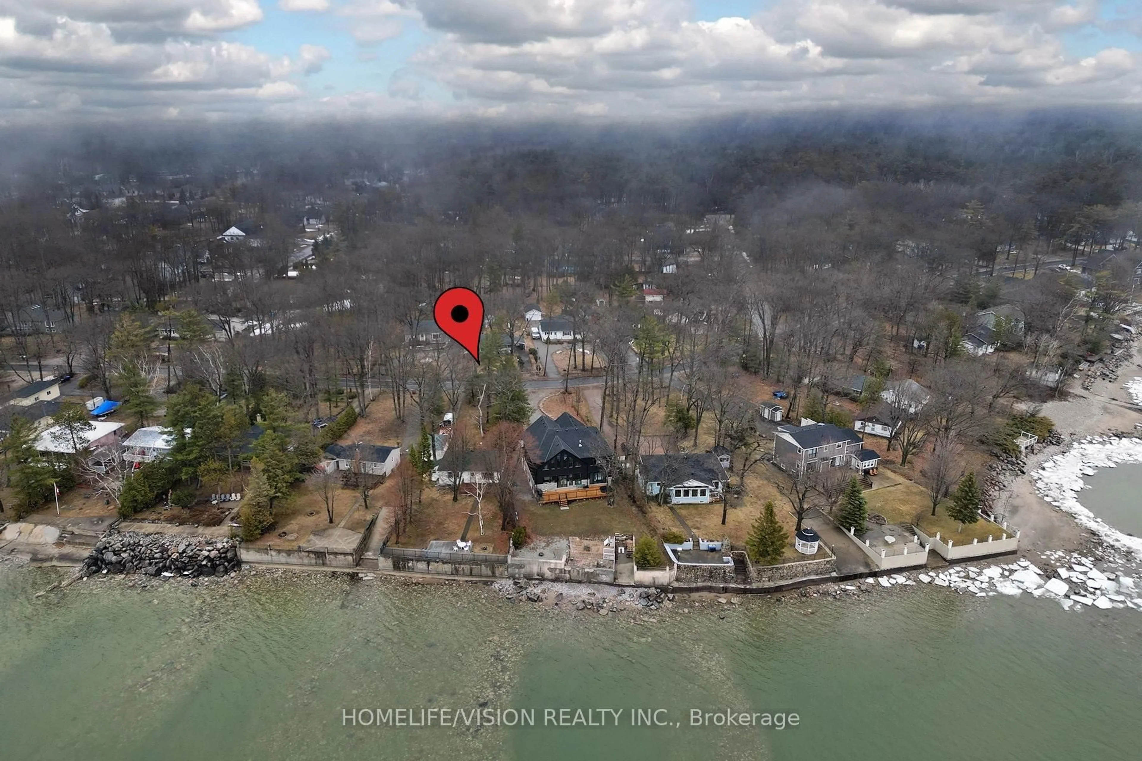 A pic from outside/outdoor area/front of a property/back of a property/a pic from drone, water/lake/river/ocean view for 1807 Tiny Beaches Rd, Tiny Ontario L0L 1P1
