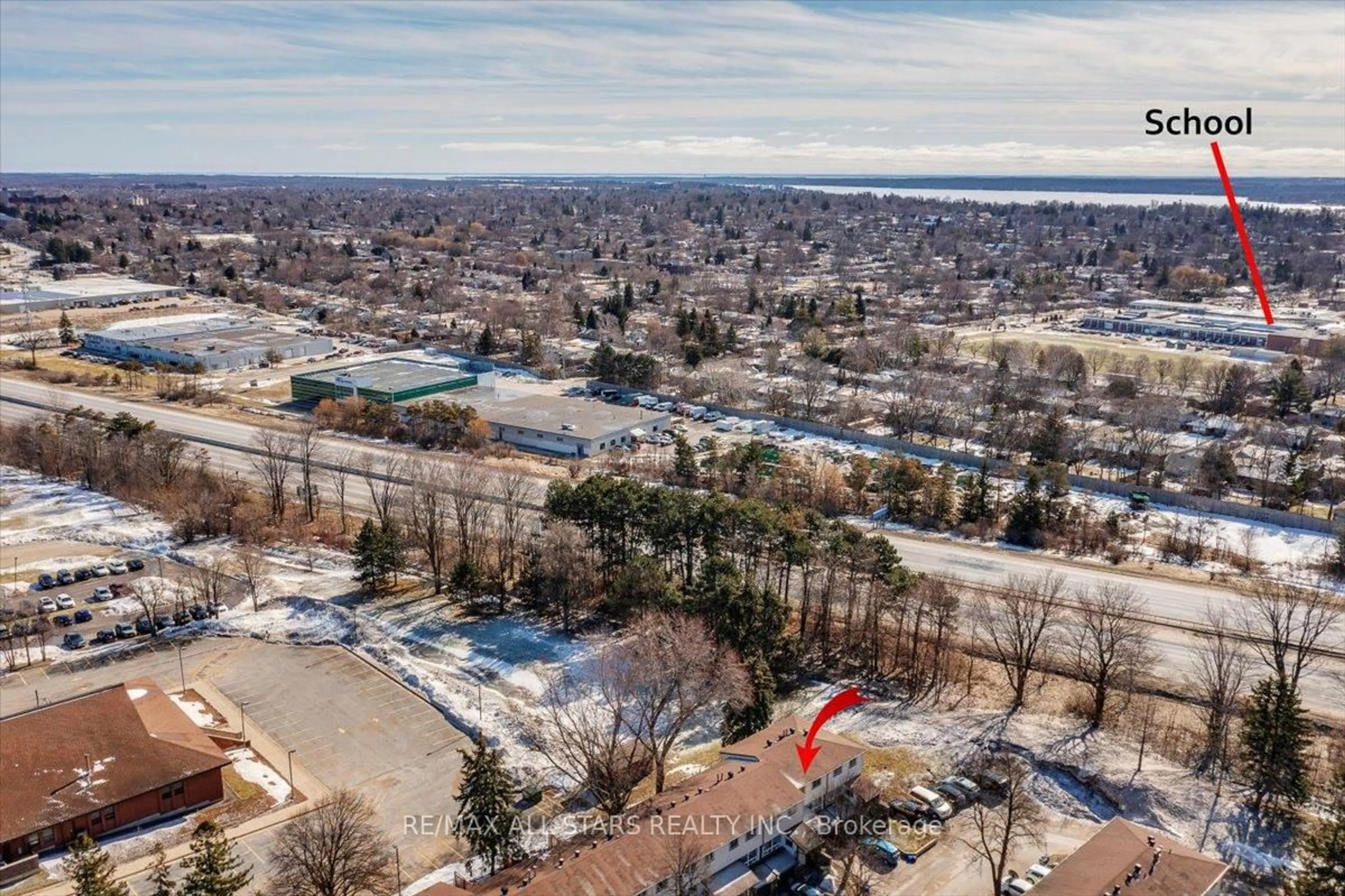A pic from outside/outdoor area/front of a property/back of a property/a pic from drone, water/lake/river/ocean view for 63 Ferris Lane #B11, Barrie Ontario L4M 5C4