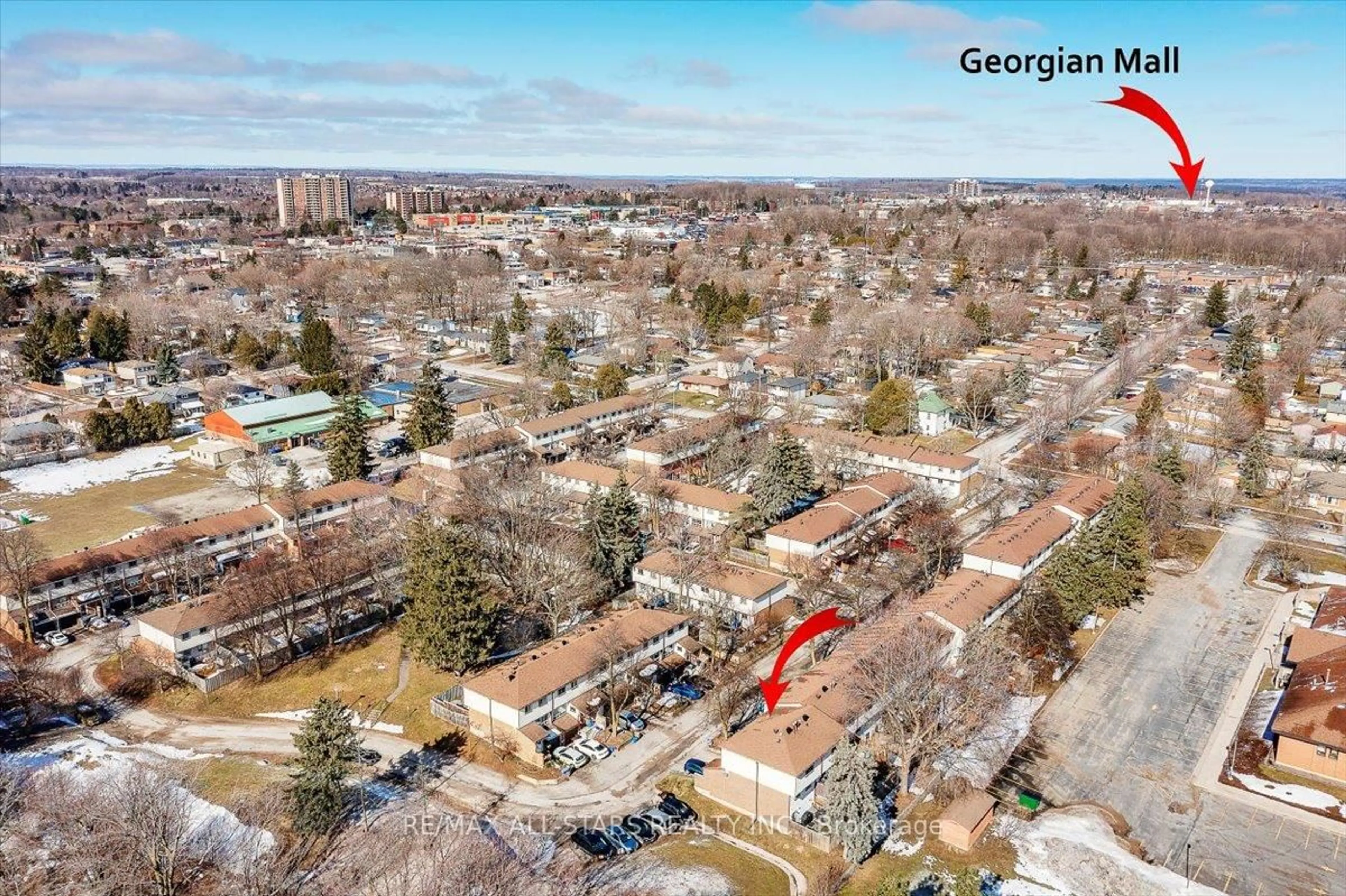 A pic from outside/outdoor area/front of a property/back of a property/a pic from drone, unknown for 63 Ferris Lane #B11, Barrie Ontario L4M 5C4
