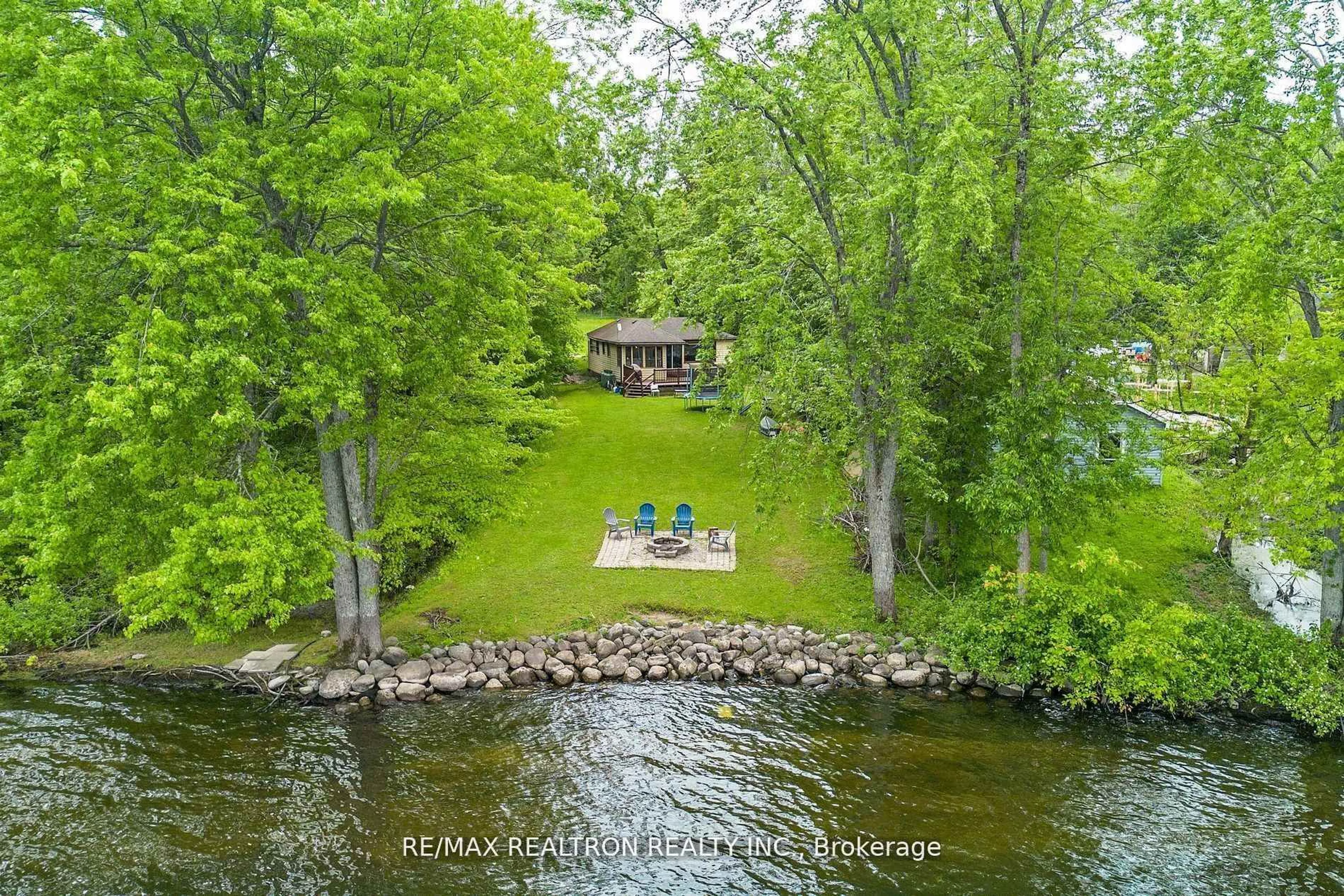 A pic from outside/outdoor area/front of a property/back of a property/a pic from drone, water/lake/river/ocean view for 6090 Sheba Dr, Ramara Ontario L3V 6H3