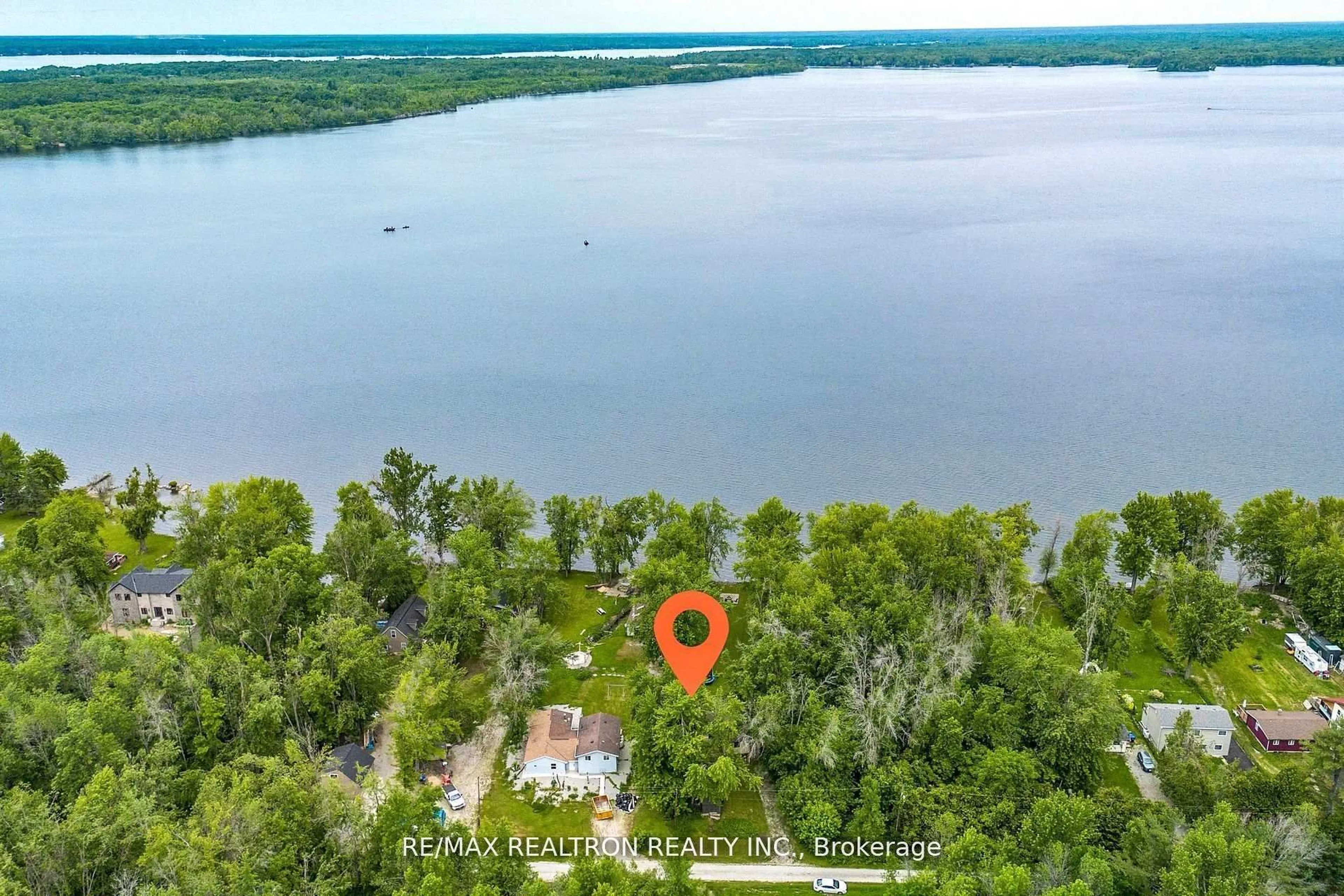 A pic from outside/outdoor area/front of a property/back of a property/a pic from drone, water/lake/river/ocean view for 6090 Sheba Dr, Ramara Ontario L3V 6H3