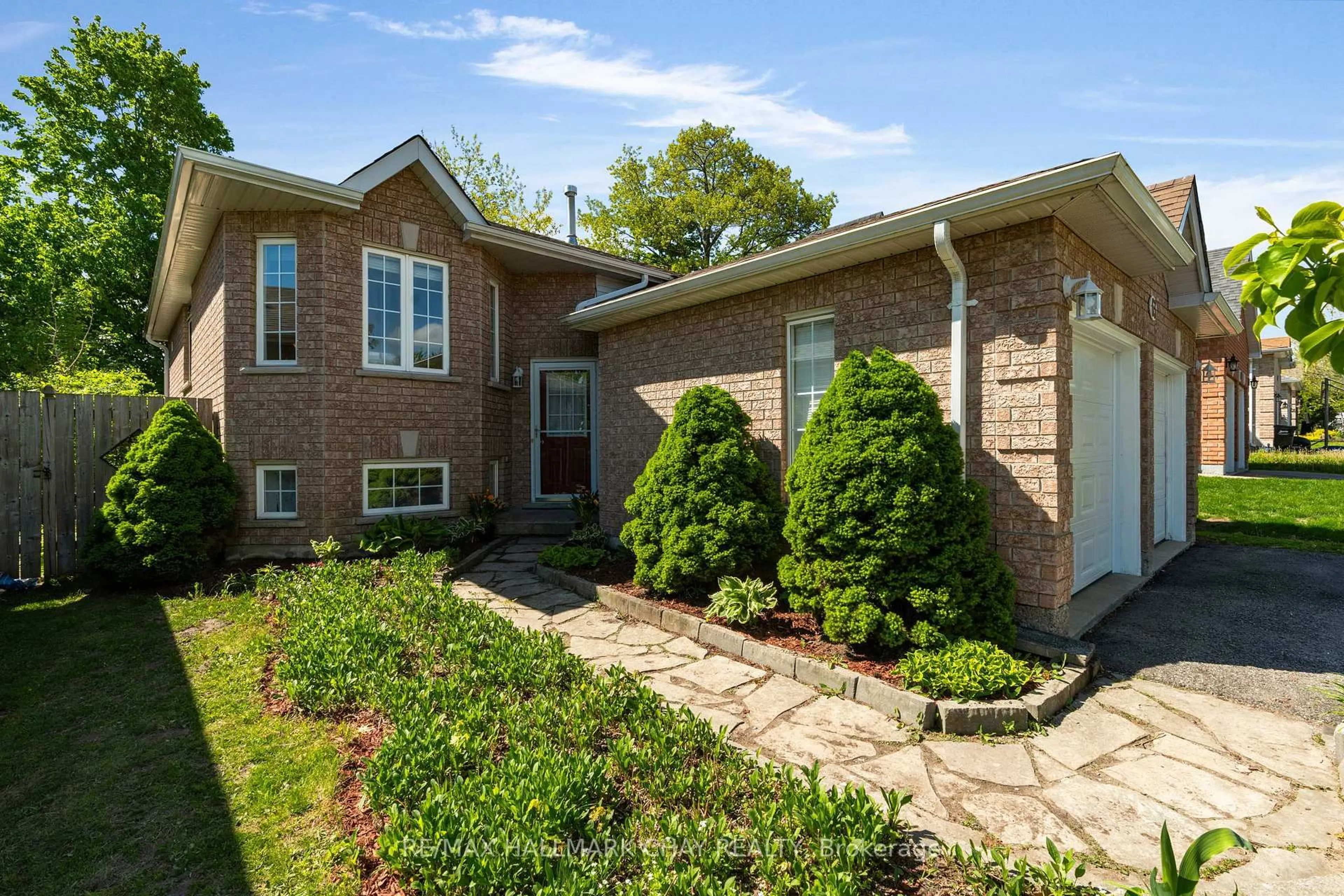 Home with brick exterior material, street for 63 Masters Dr, Barrie Ontario L4M 6W9