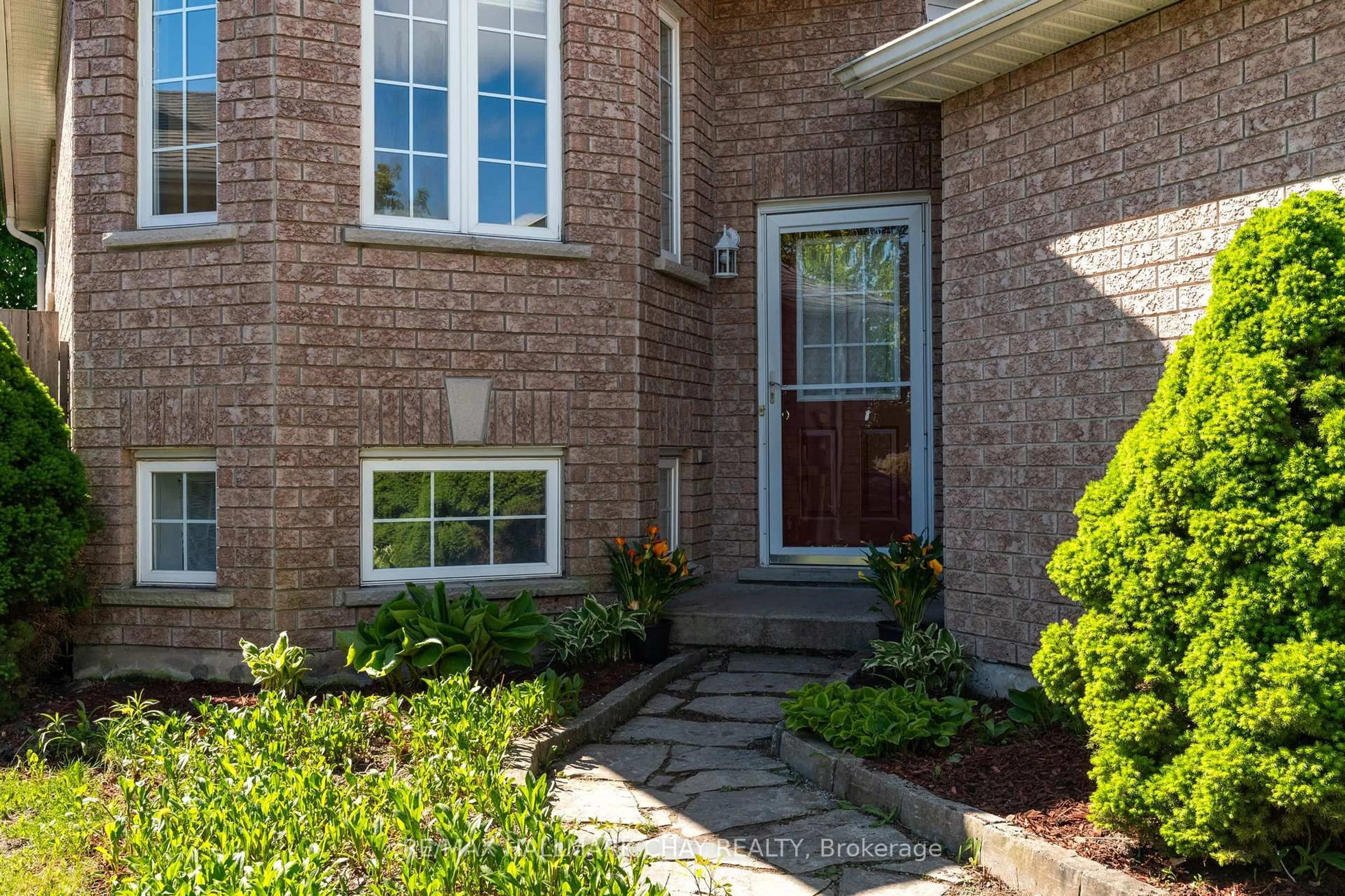 Home with brick exterior material, street for 63 Masters Dr, Barrie Ontario L4M 6W9
