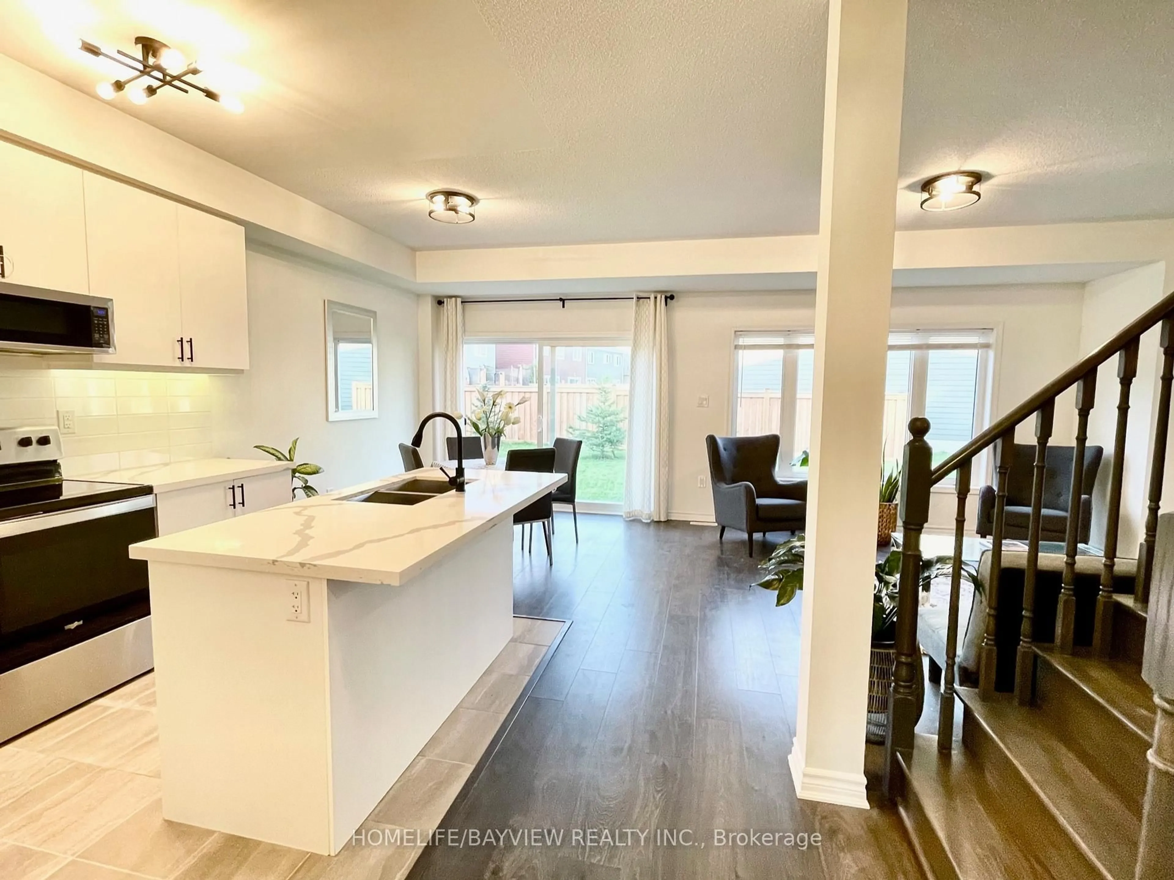 Open concept kitchen, unknown for 128 Village Gate Dr, Wasaga Beach Ontario L9Z 0J7