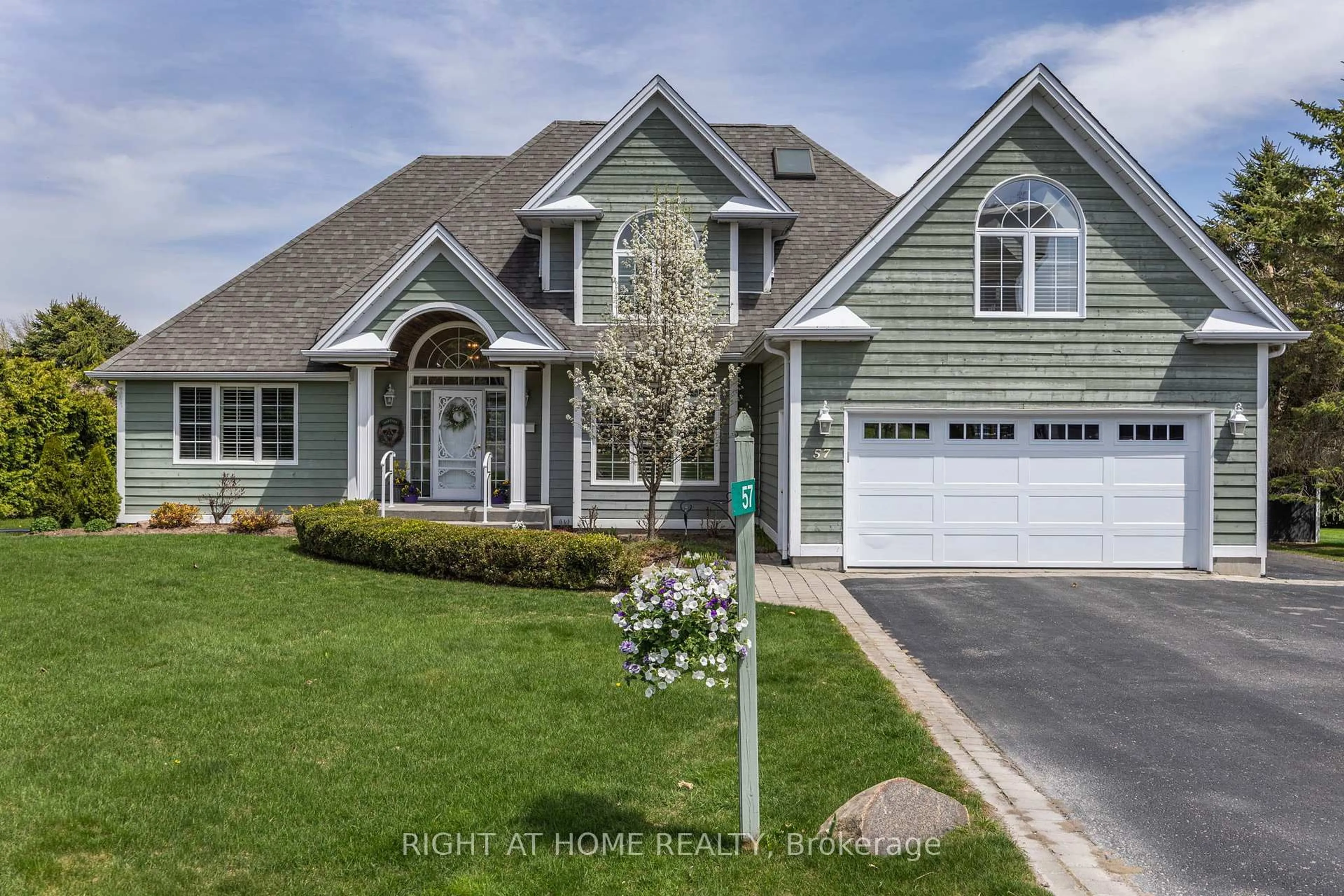 Home with vinyl exterior material, street for 57 Highland Dr, Oro-Medonte Ontario L0L 2L0