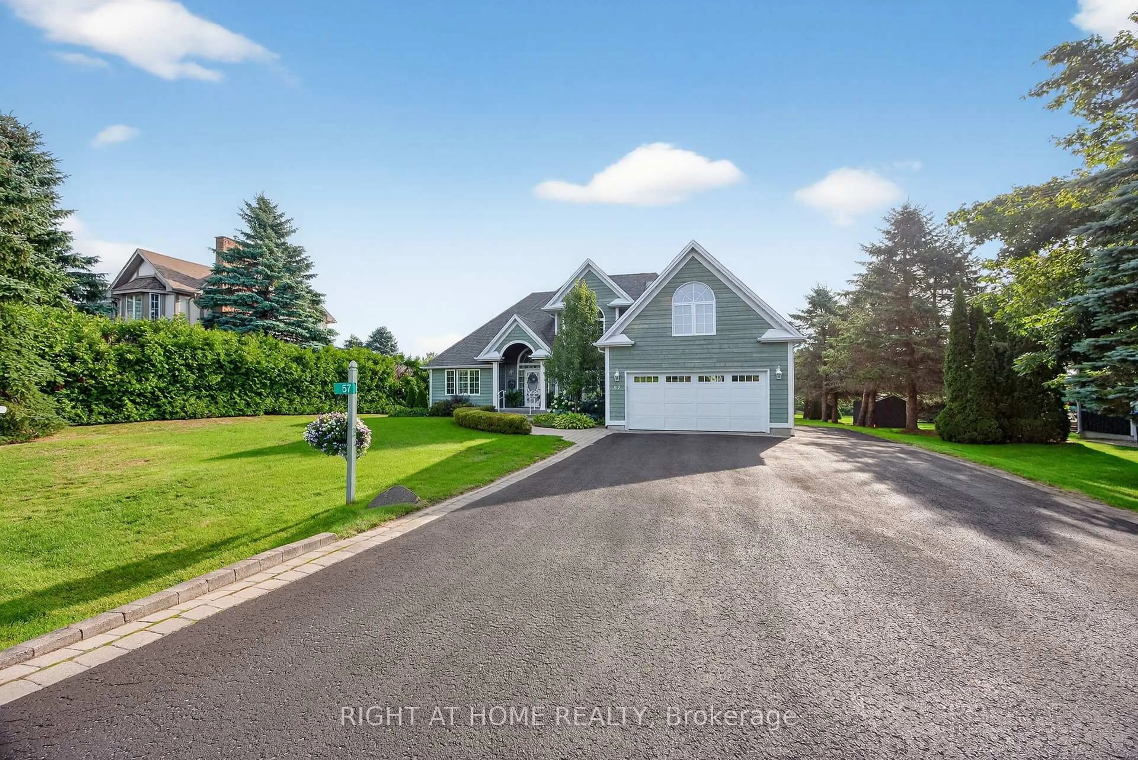 A pic from outside/outdoor area/front of a property/back of a property/a pic from drone, street for 57 Highland Dr, Oro-Medonte Ontario L0L 2L0