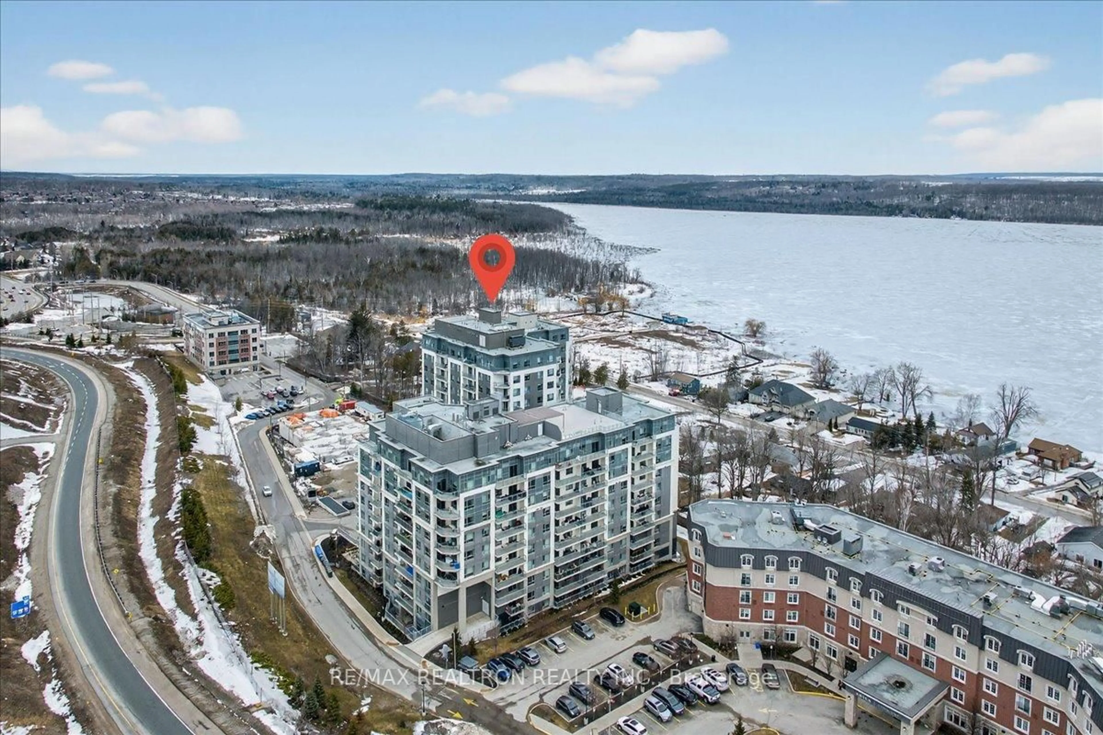 A pic from outside/outdoor area/front of a property/back of a property/a pic from drone, water/lake/river/ocean view for 56 Lakeside Terr #510, Barrie Ontario L4M 7B9