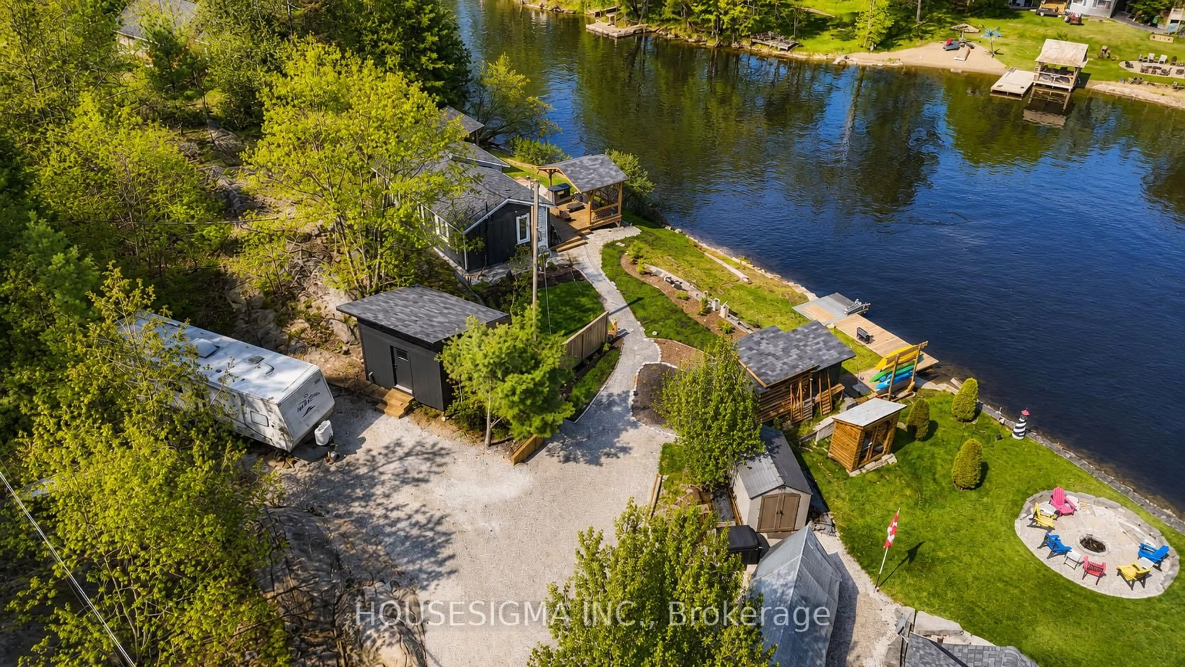 A pic from outside/outdoor area/front of a property/back of a property/a pic from drone, water/lake/river/ocean view for 8150 Laidlaw Ave, Ramara Ontario L0K 2B0