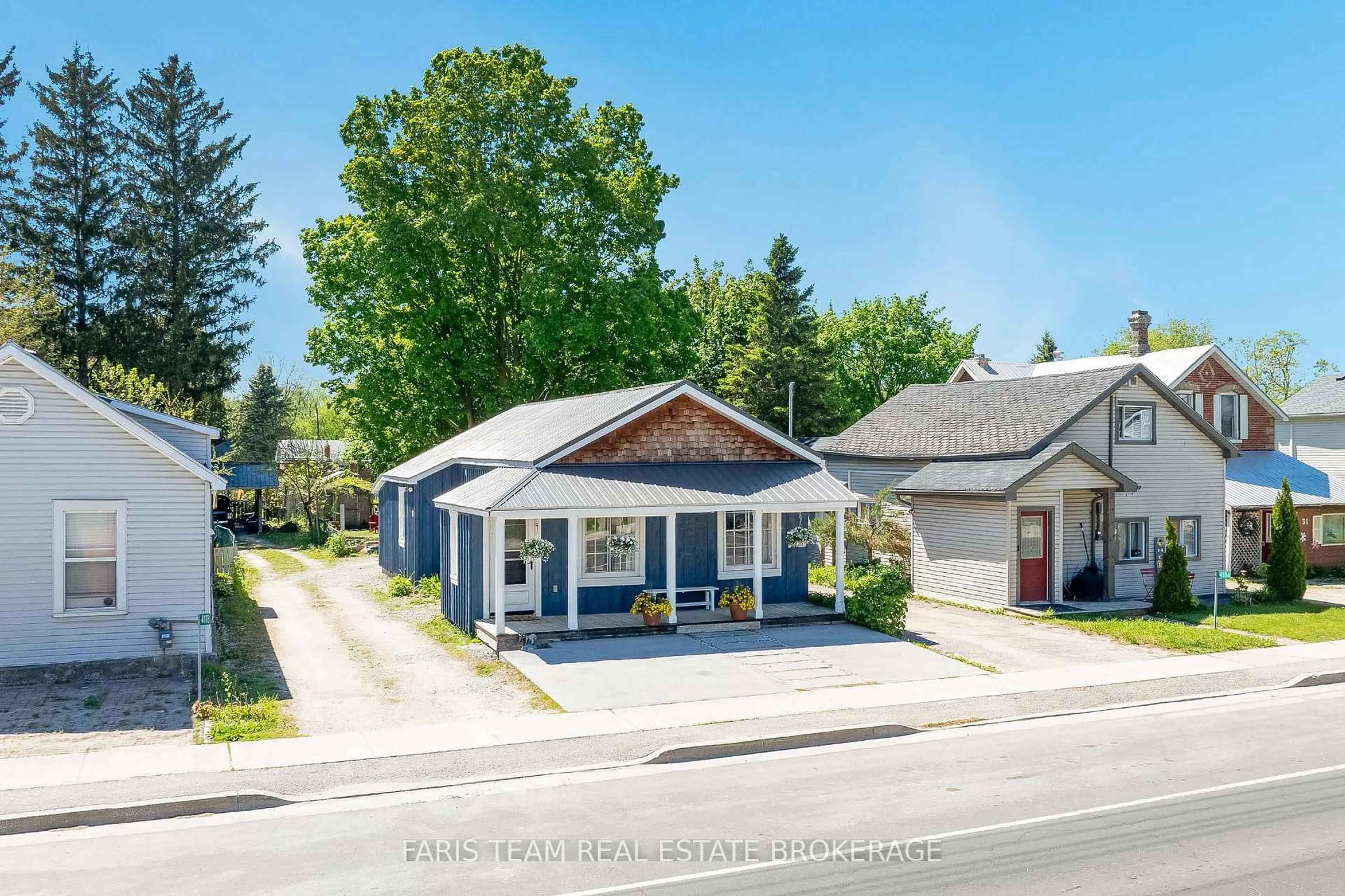 A pic from outside/outdoor area/front of a property/back of a property/a pic from drone, street for 4182 County Road 124, Clearview Ontario L0M 1P0