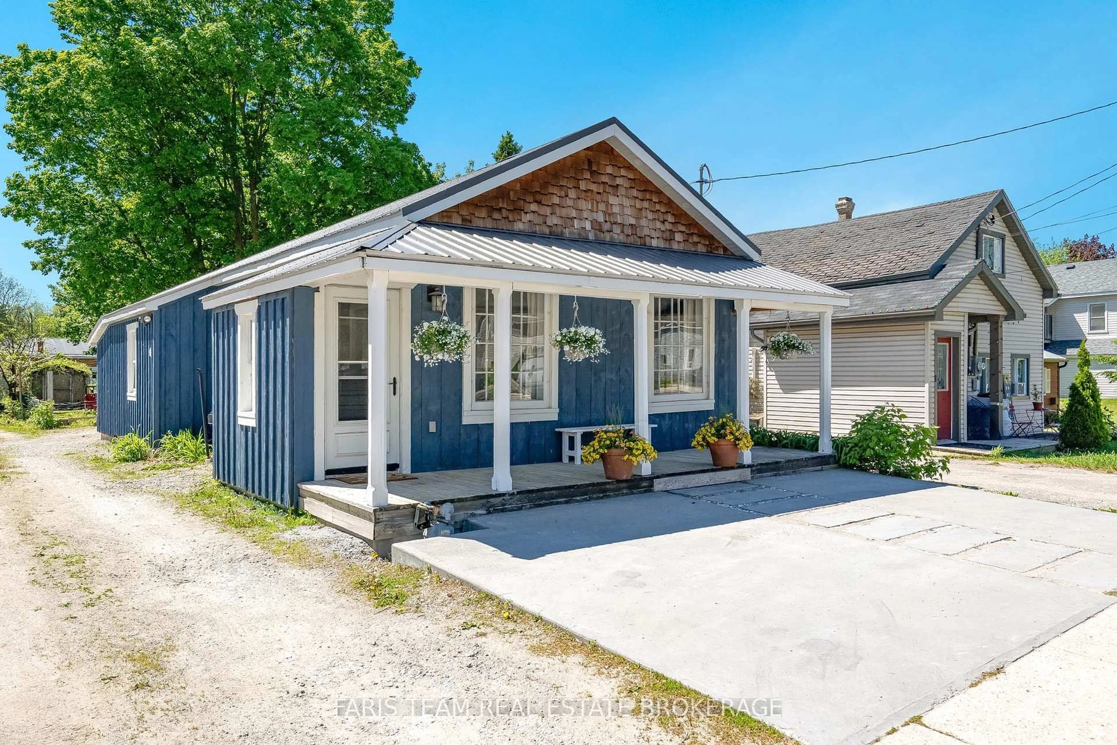 Home with vinyl exterior material, street for 4182 County Road 124, Clearview Ontario L0M 1P0