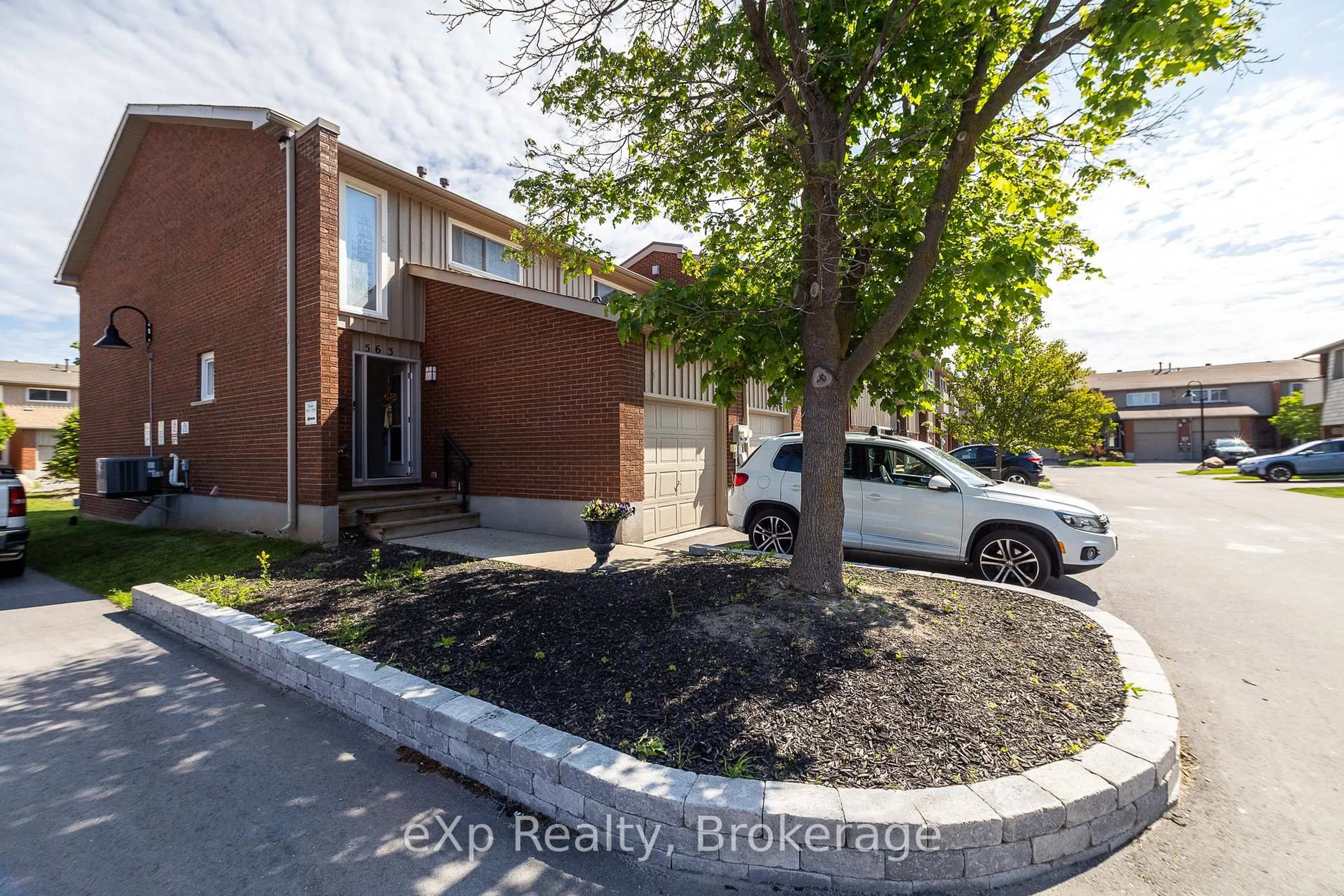 A pic from outside/outdoor area/front of a property/back of a property/a pic from drone, street for 563 Tenth St #12, Collingwood Ontario L9Y 4K6