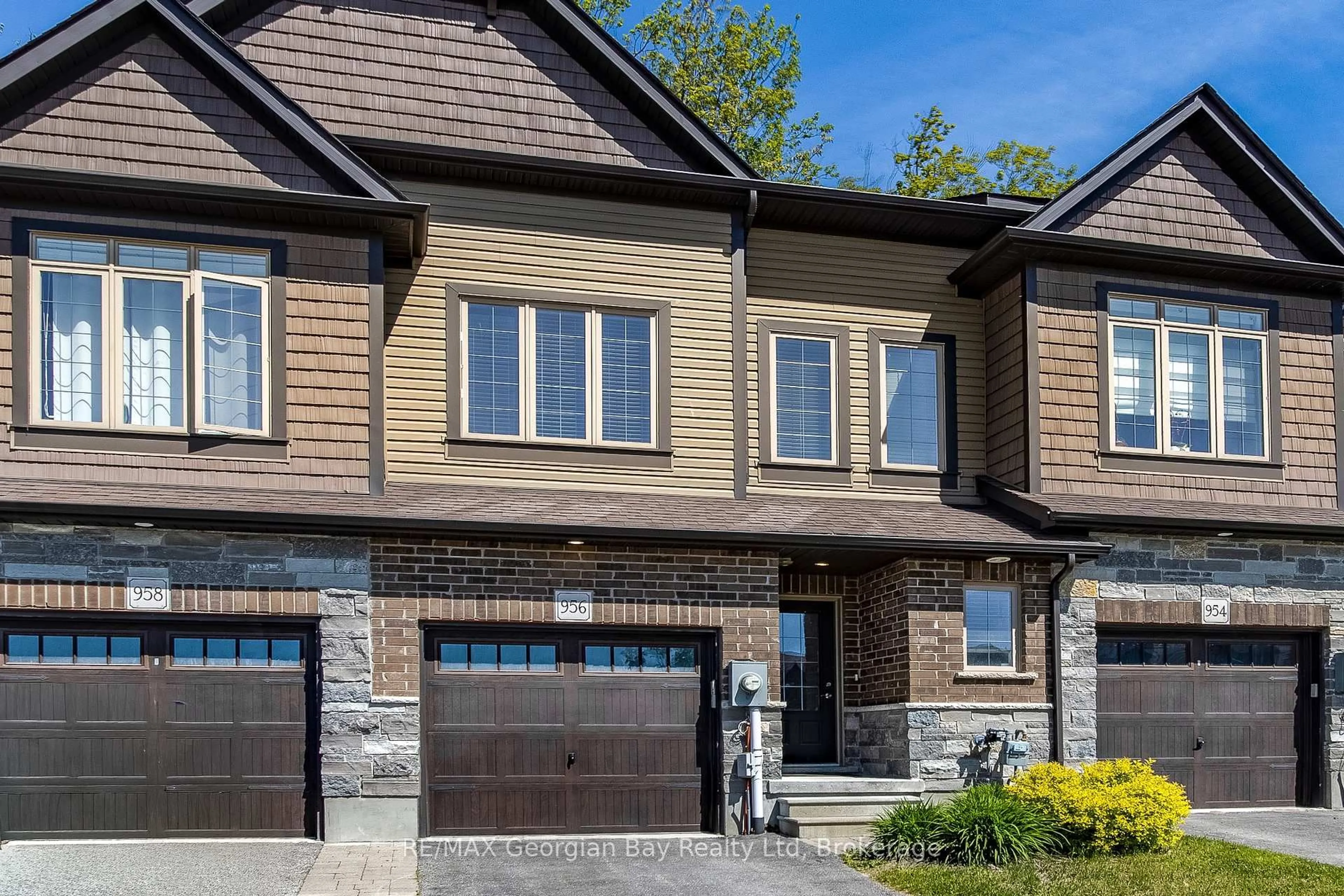 Home with brick exterior material, street for 956 Cook Dr, Midland Ontario L4R 0E4