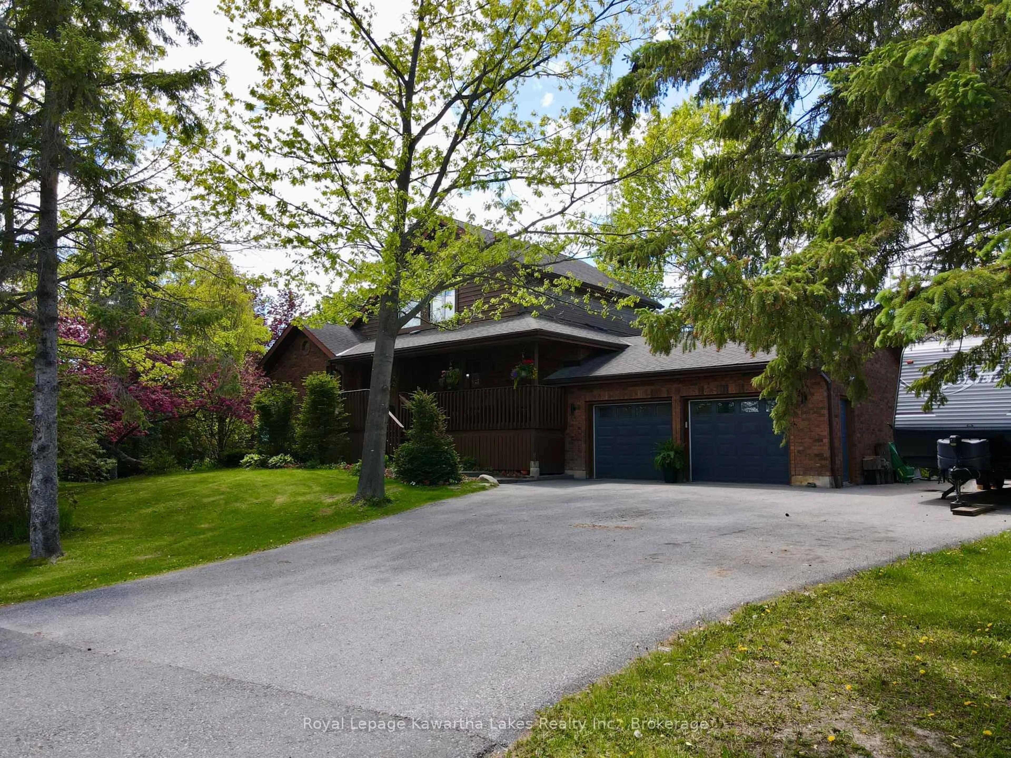 A pic from outside/outdoor area/front of a property/back of a property/a pic from drone, street for 1638 Road 51 County Rd, Ramara Ontario L0K 1B0