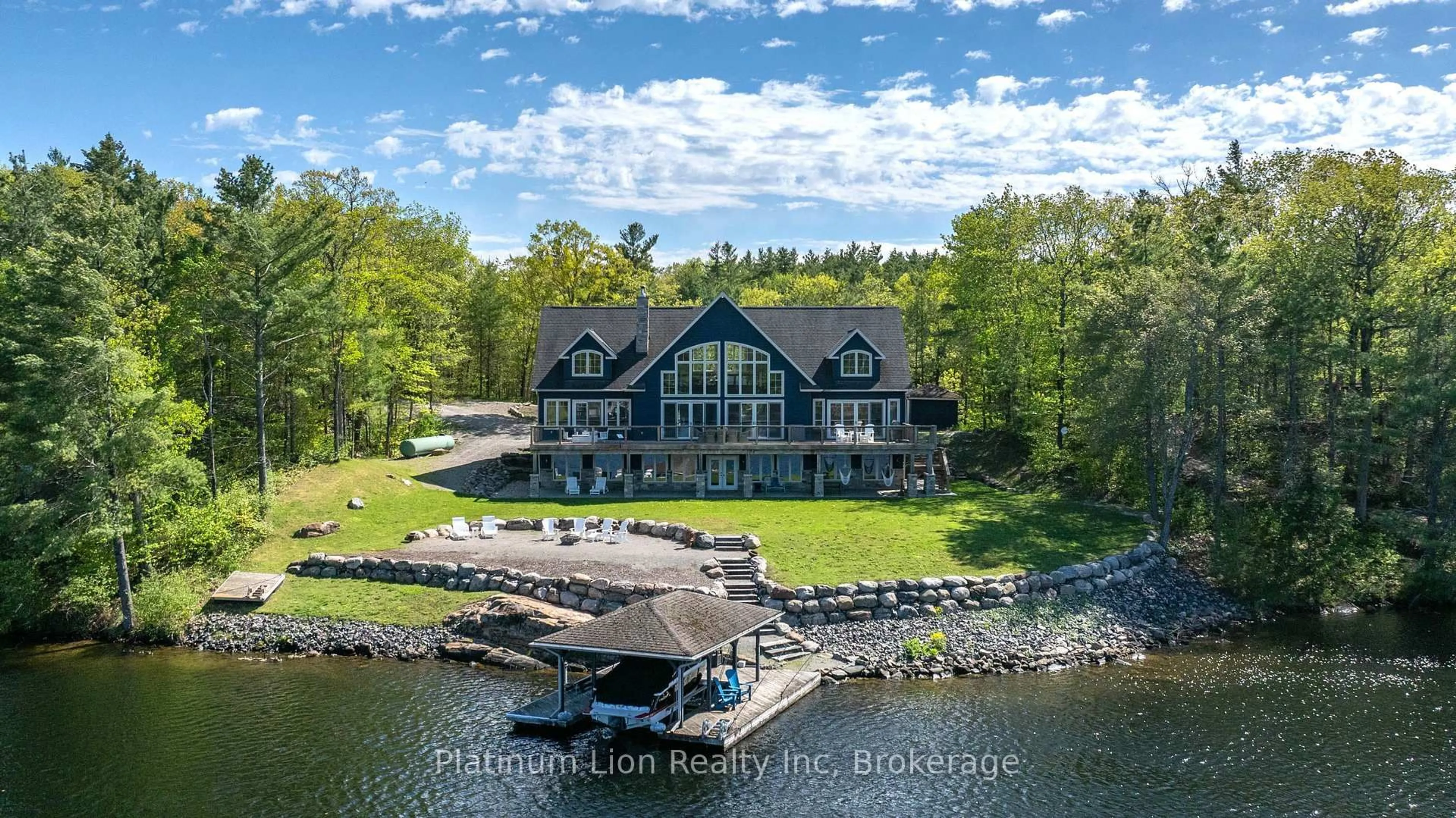A pic from outside/outdoor area/front of a property/back of a property/a pic from drone, water/lake/river/ocean view for 1521 Emily Lane, Severn Ontario L0K 1E0
