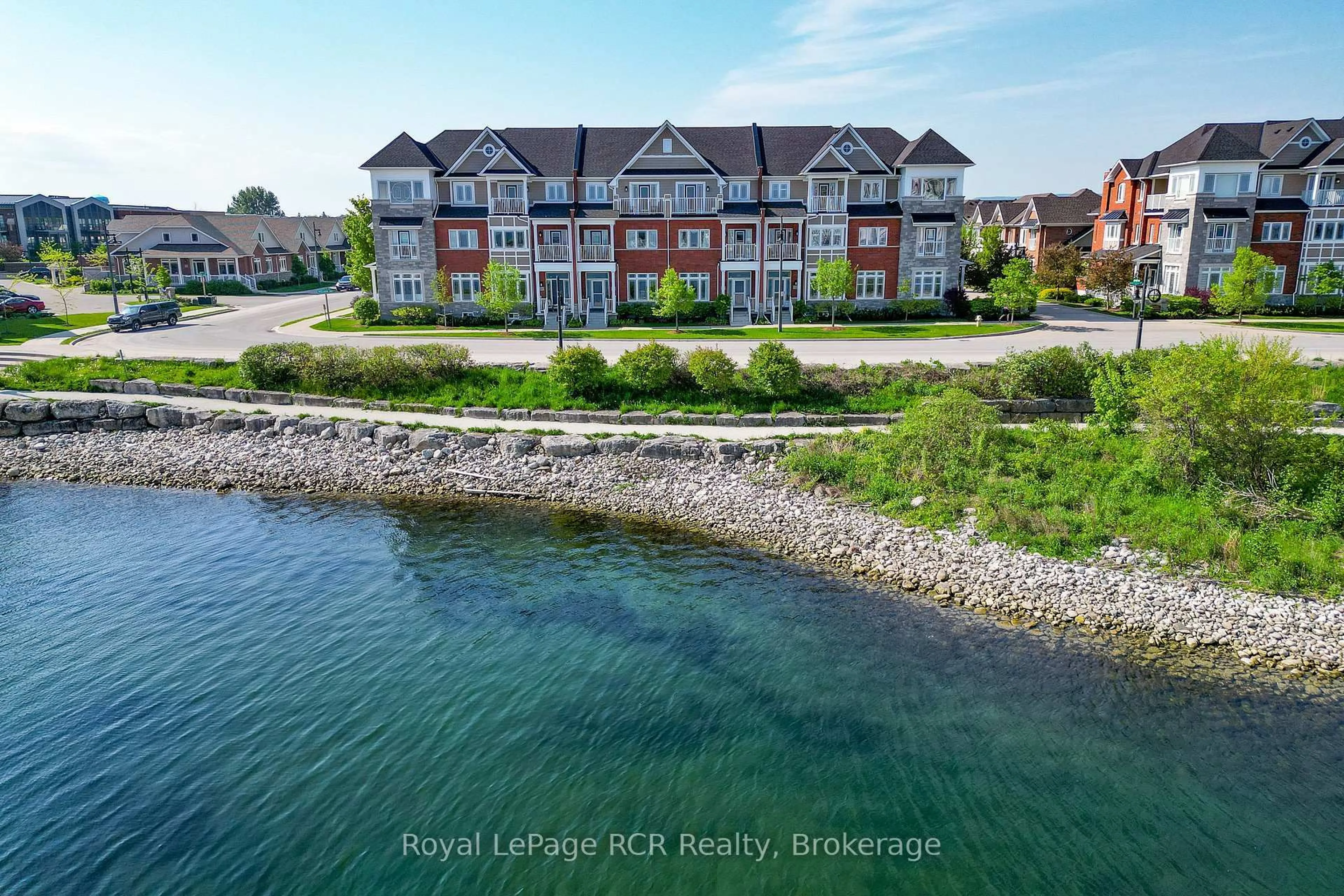 A pic from outside/outdoor area/front of a property/back of a property/a pic from drone, water/lake/river/ocean view for 16 Wheelhouse Cres, Collingwood Ontario L9Y 0J9