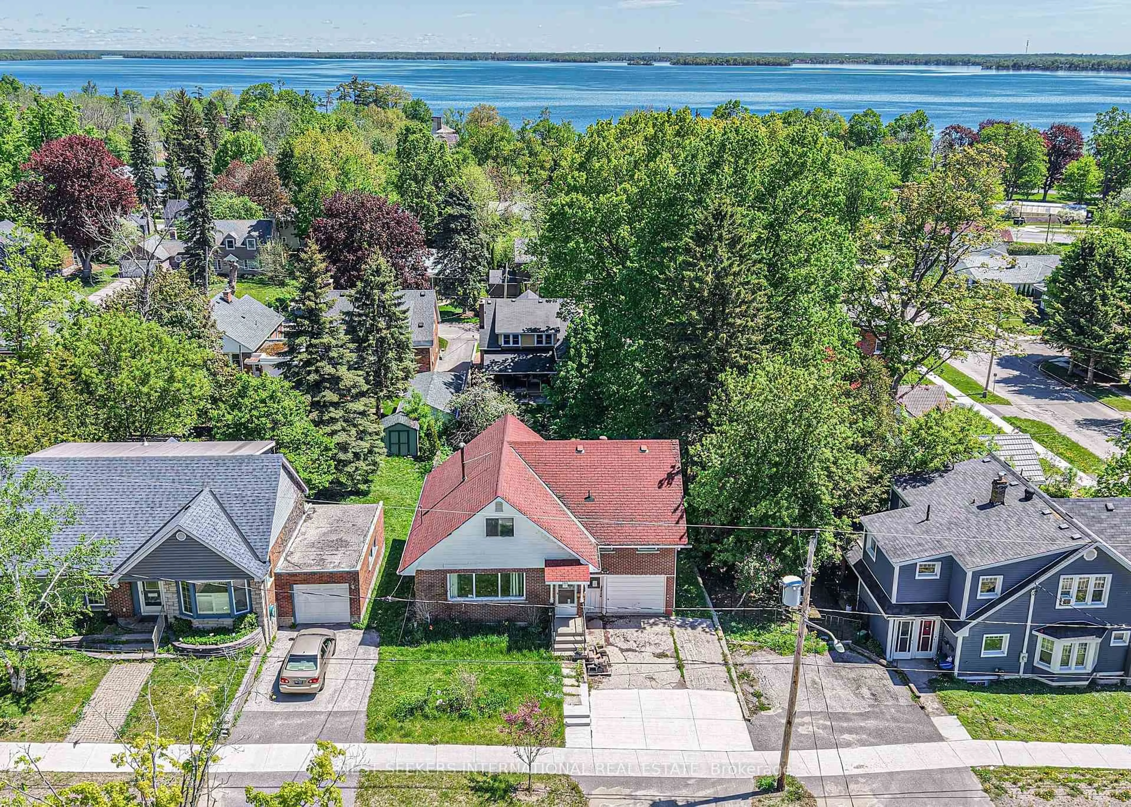 A pic from outside/outdoor area/front of a property/back of a property/a pic from drone, water/lake/river/ocean view for 166 Laclie St, Orillia Ontario L3V 4N4