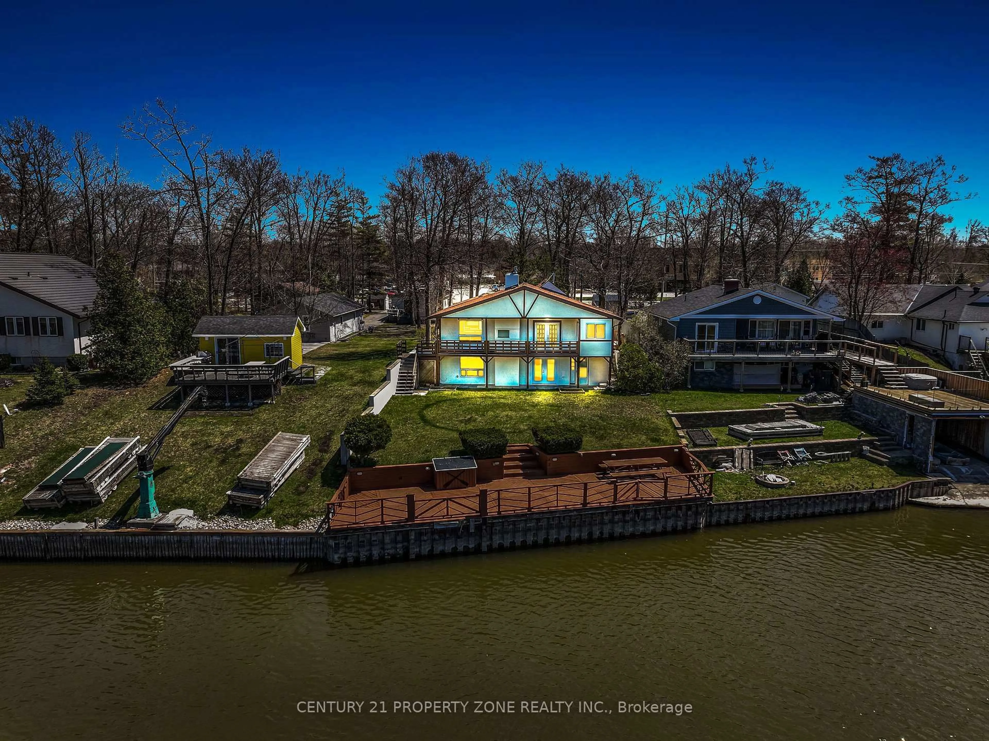 A pic from outside/outdoor area/front of a property/back of a property/a pic from drone, water/lake/river/ocean view for 1312 River Rd, Wasaga Beach Ontario L9Z 2W6