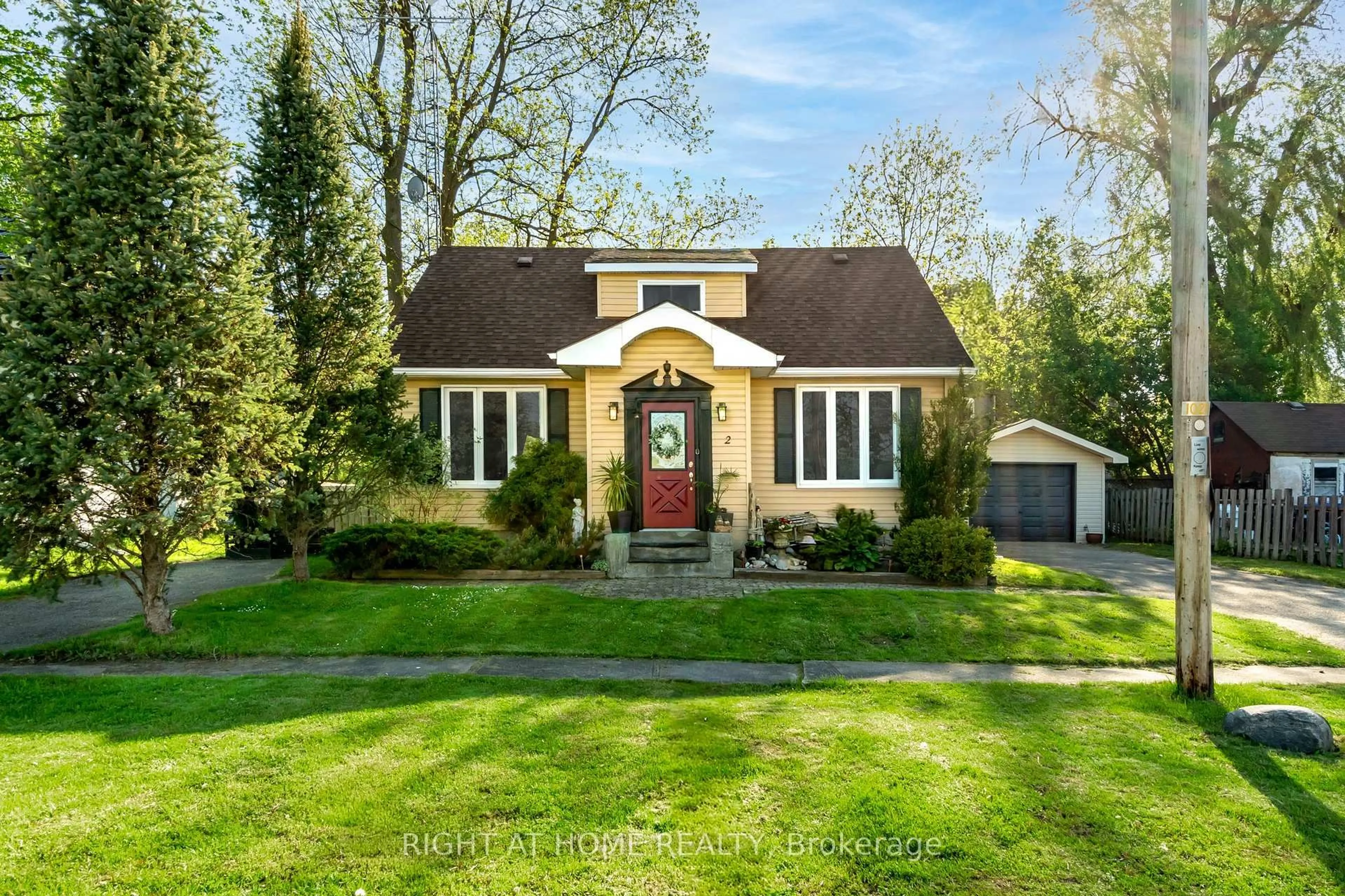 Home with vinyl exterior material, street for 2 Hogback Rd, Clearview Ontario L0M 1N0