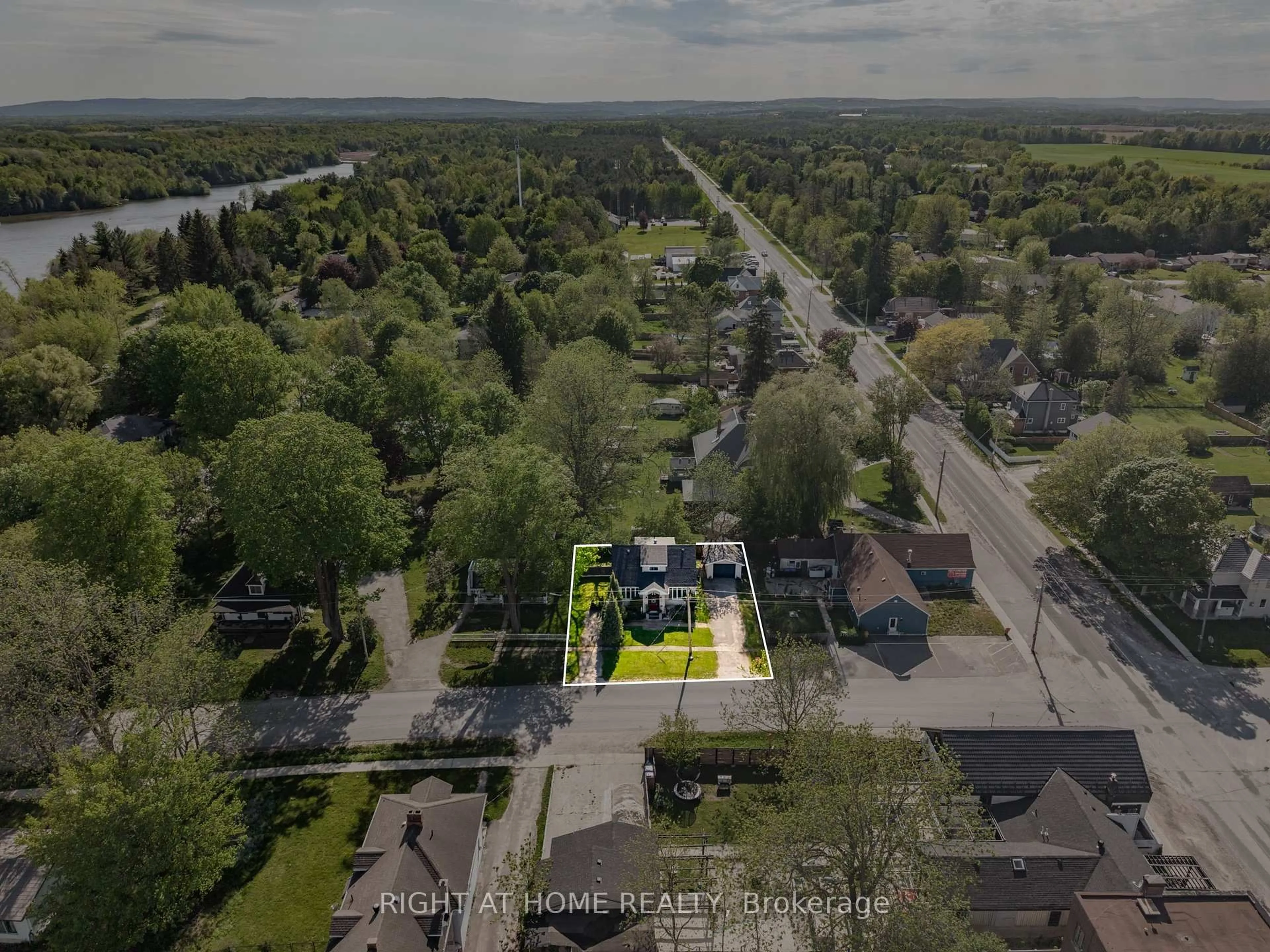 A pic from outside/outdoor area/front of a property/back of a property/a pic from drone, street for 2 Hogback Rd, Clearview Ontario L0M 1N0