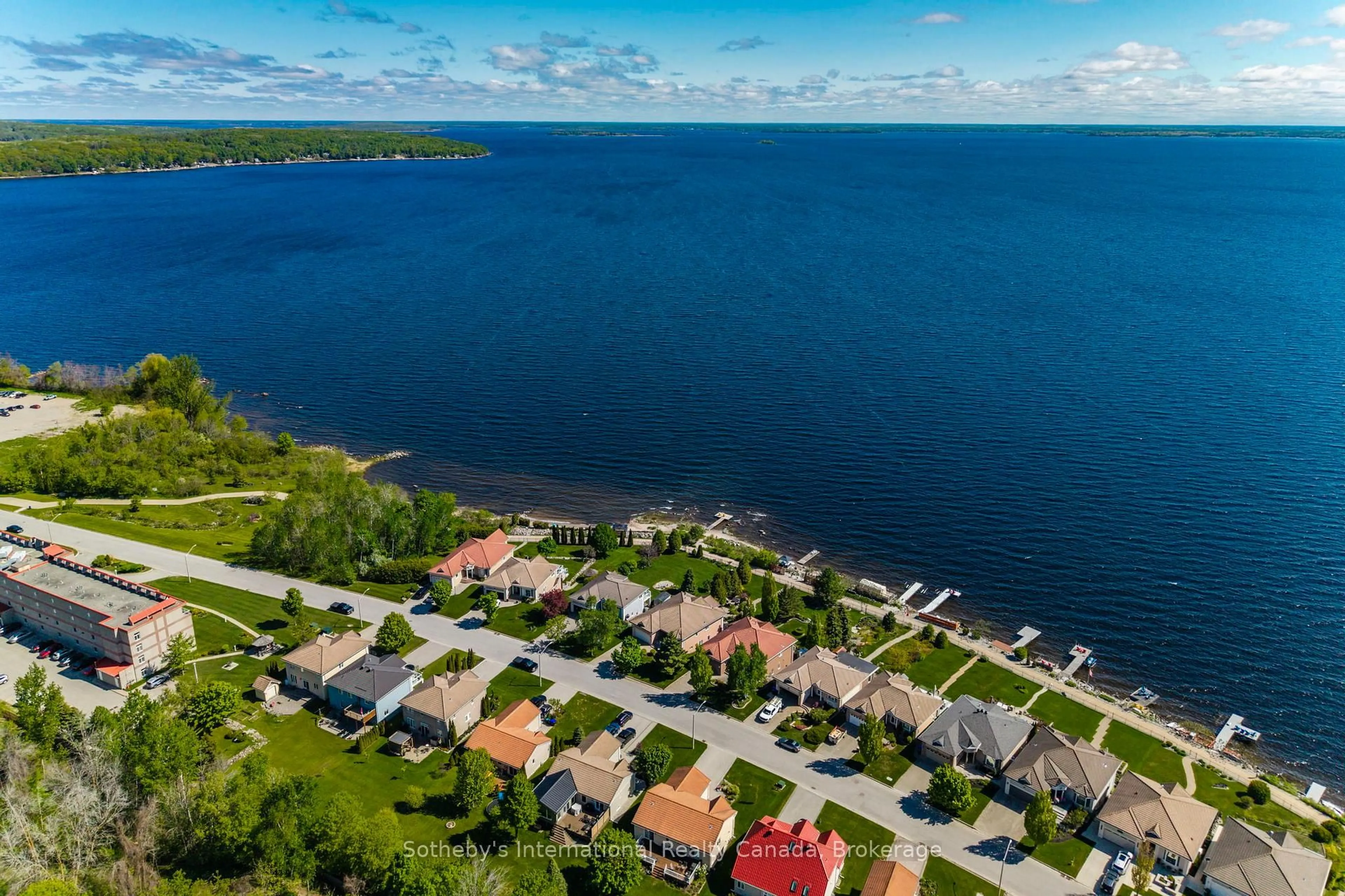 A pic from outside/outdoor area/front of a property/back of a property/a pic from drone, water/lake/river/ocean view for 325 Aberdeen Blvd, Midland Ontario L4R 5M9