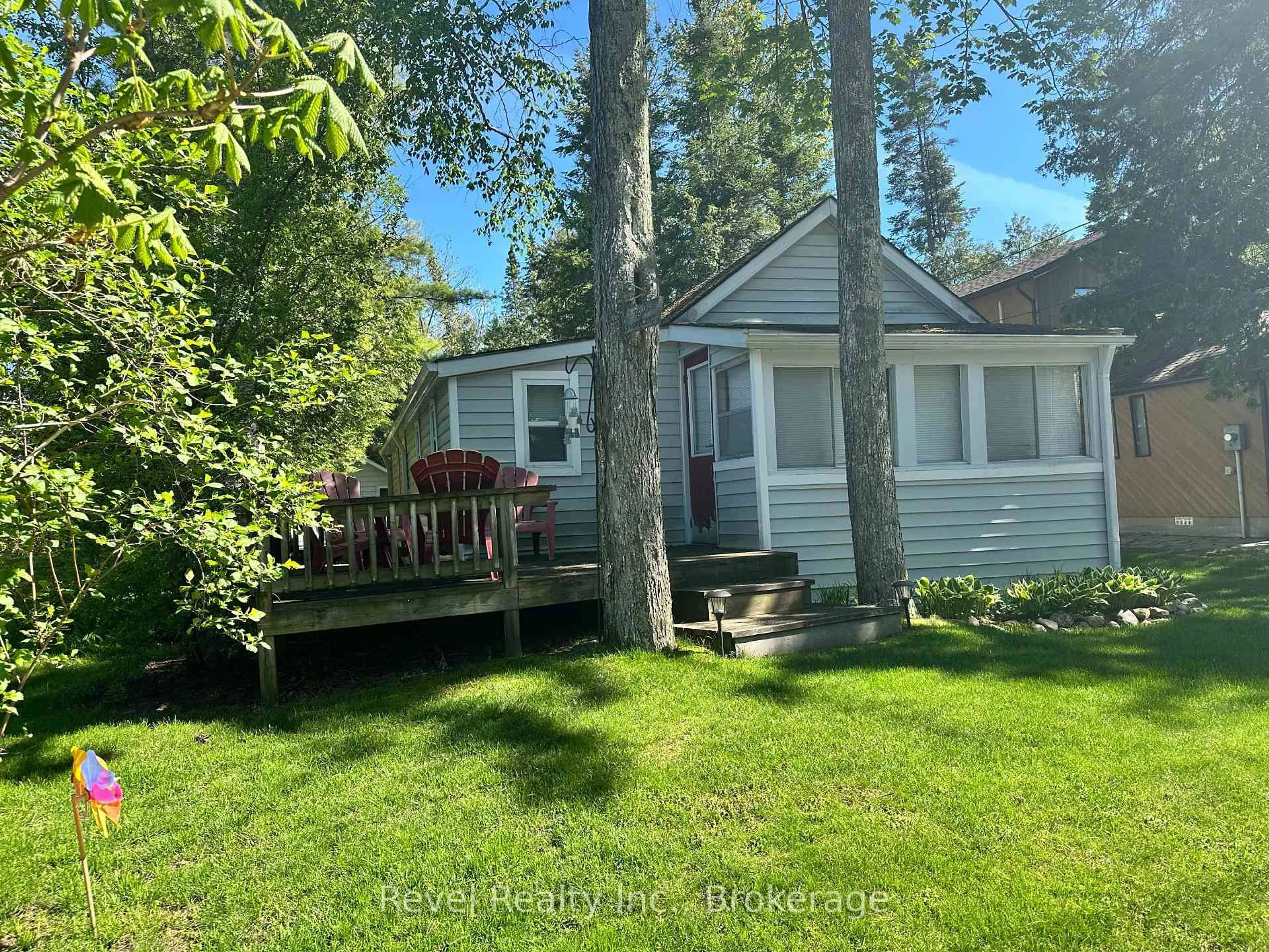 A pic from outside/outdoor area/front of a property/back of a property/a pic from drone, forest/trees view for 1693 Shore Lane, Wasaga Beach Ontario L9Z 1W4