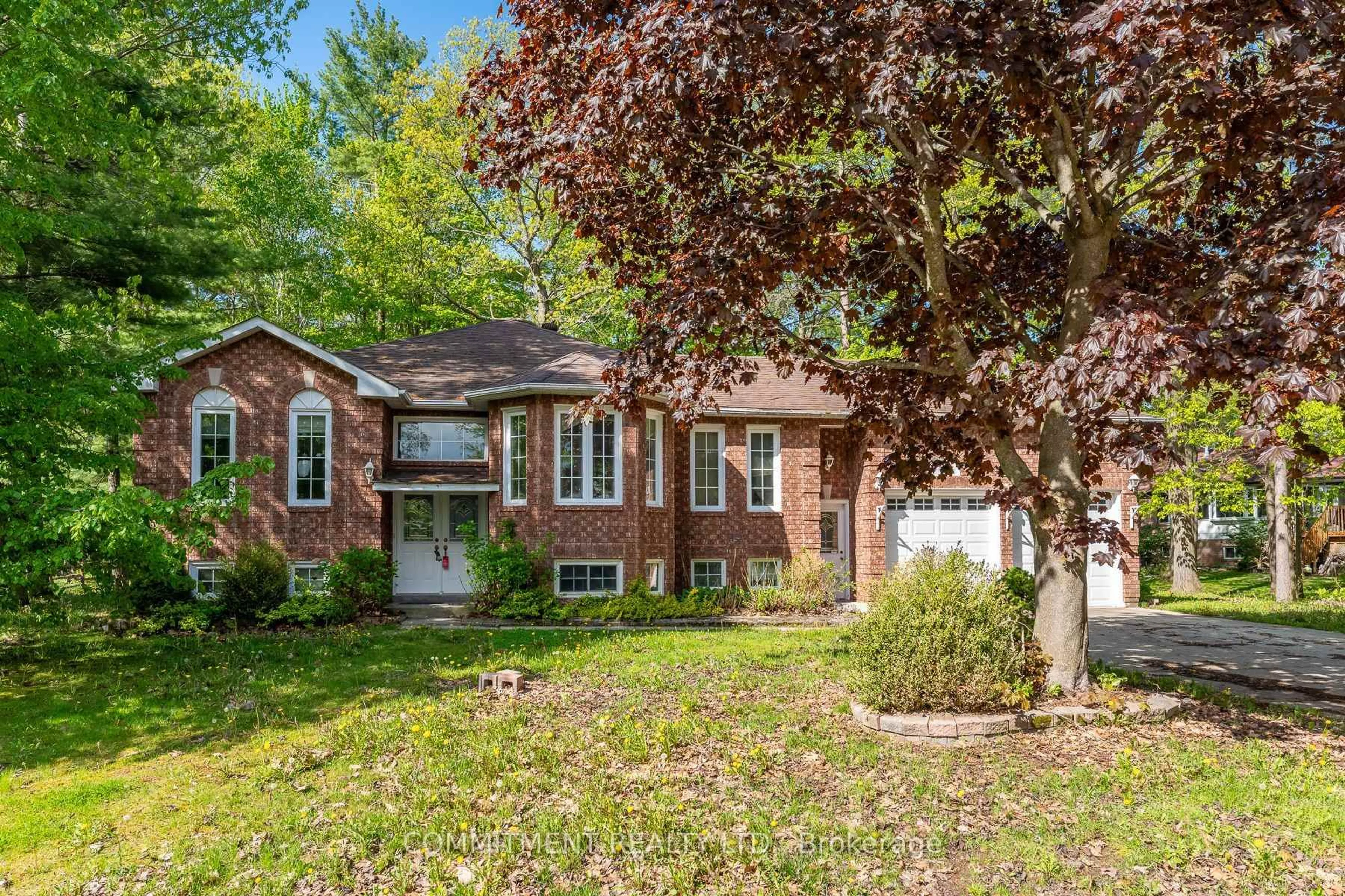Home with brick exterior material, street for 39 Downer Cres, Wasaga Beach Ontario L9Z 1C3