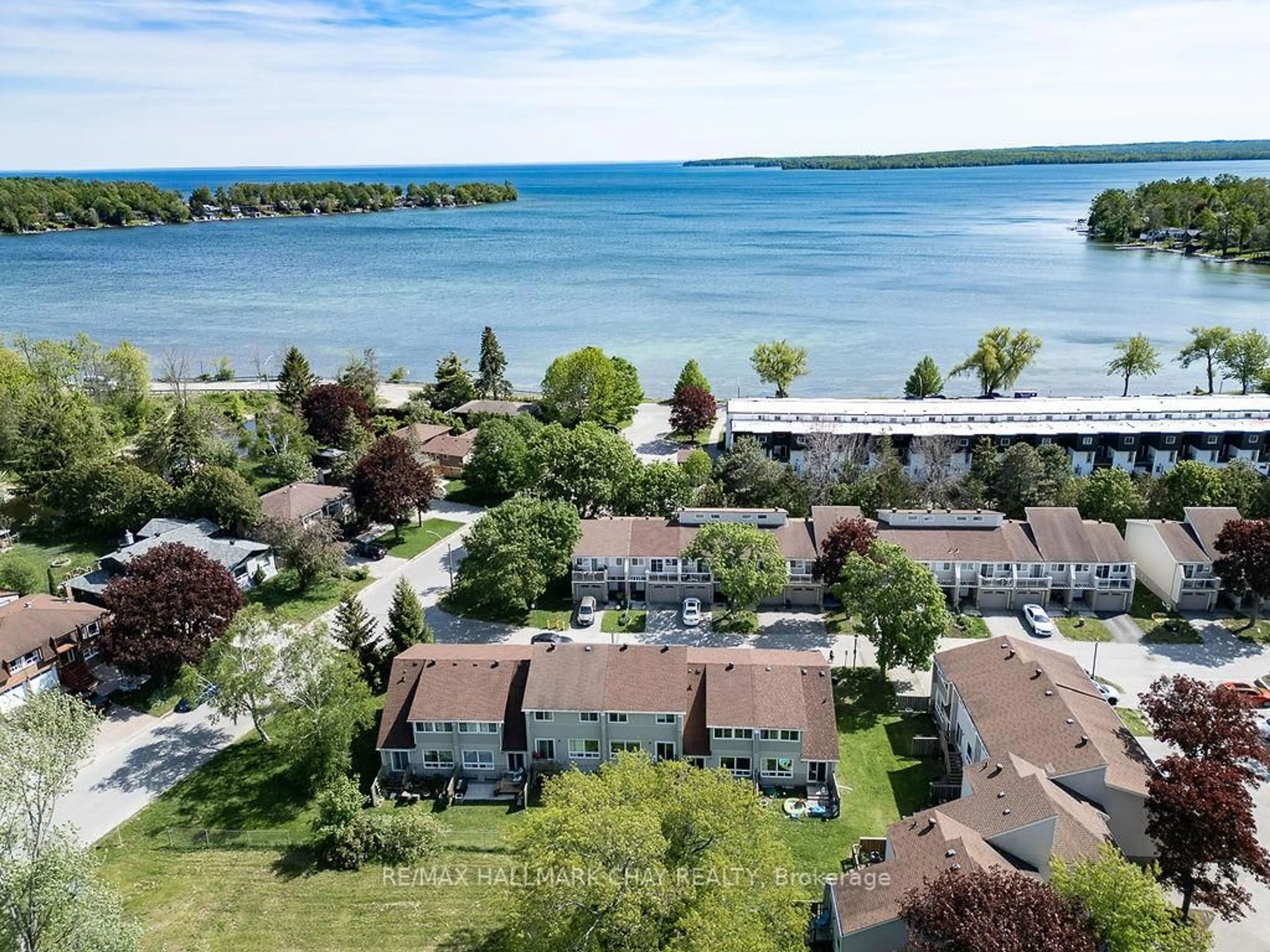 A pic from outside/outdoor area/front of a property/back of a property/a pic from drone, water/lake/river/ocean view for 12 Lankin Blvd #40, Orillia Ontario L3V 6T2