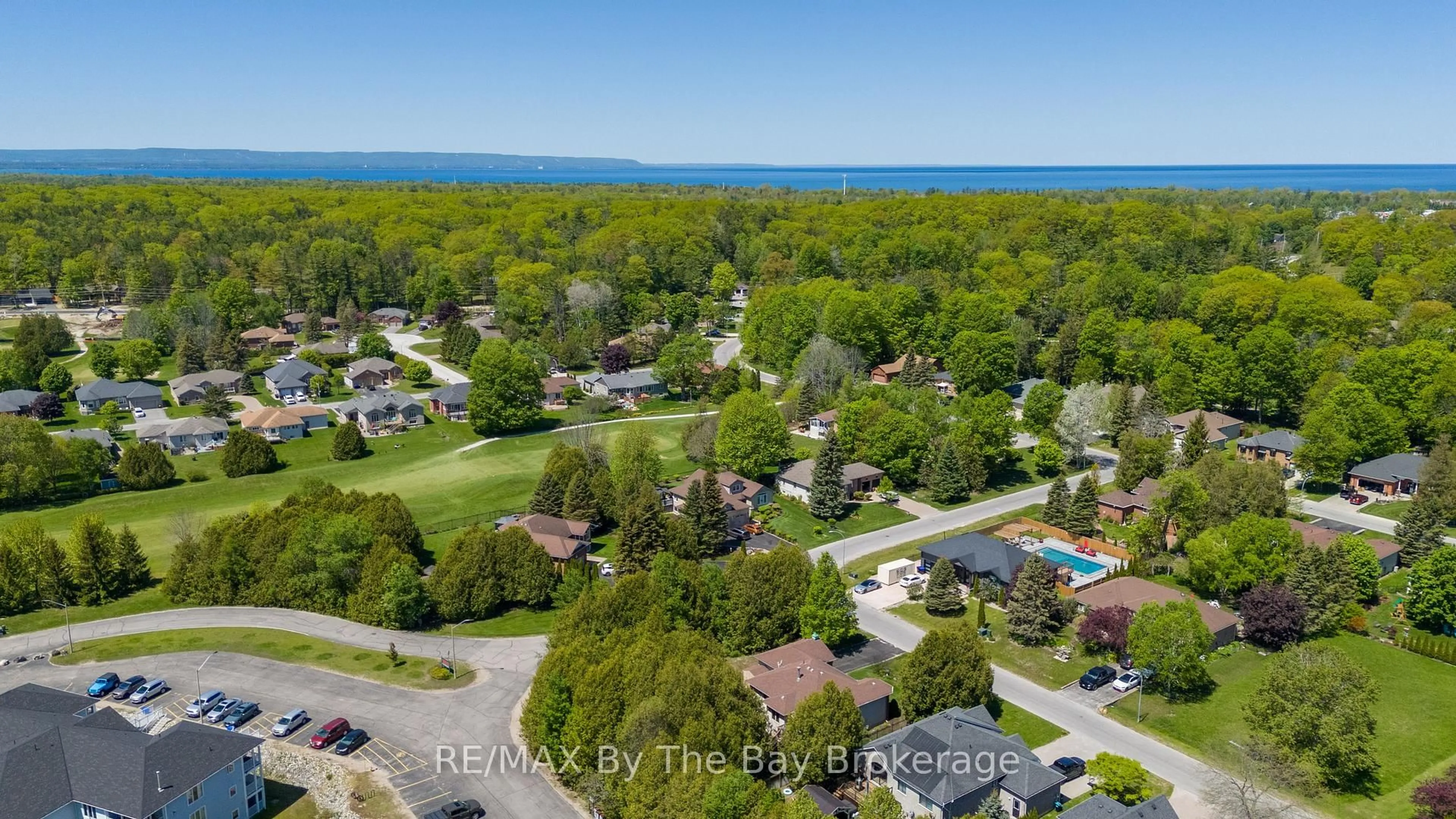 A pic from outside/outdoor area/front of a property/back of a property/a pic from drone, water/lake/river/ocean view for 10 Mulligan Lane #1, Wasaga Beach Ontario L9Z 1C4