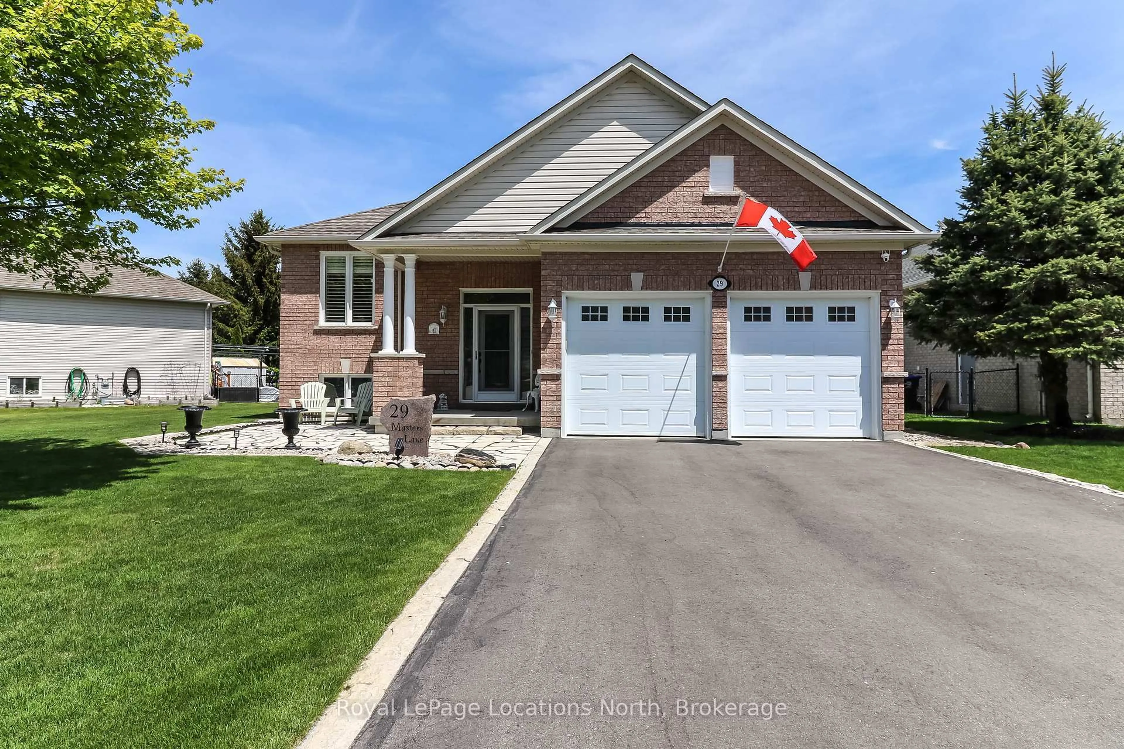 Home with brick exterior material, street for 29 Masters Lane, Wasaga Beach Ontario L9Z 1S8