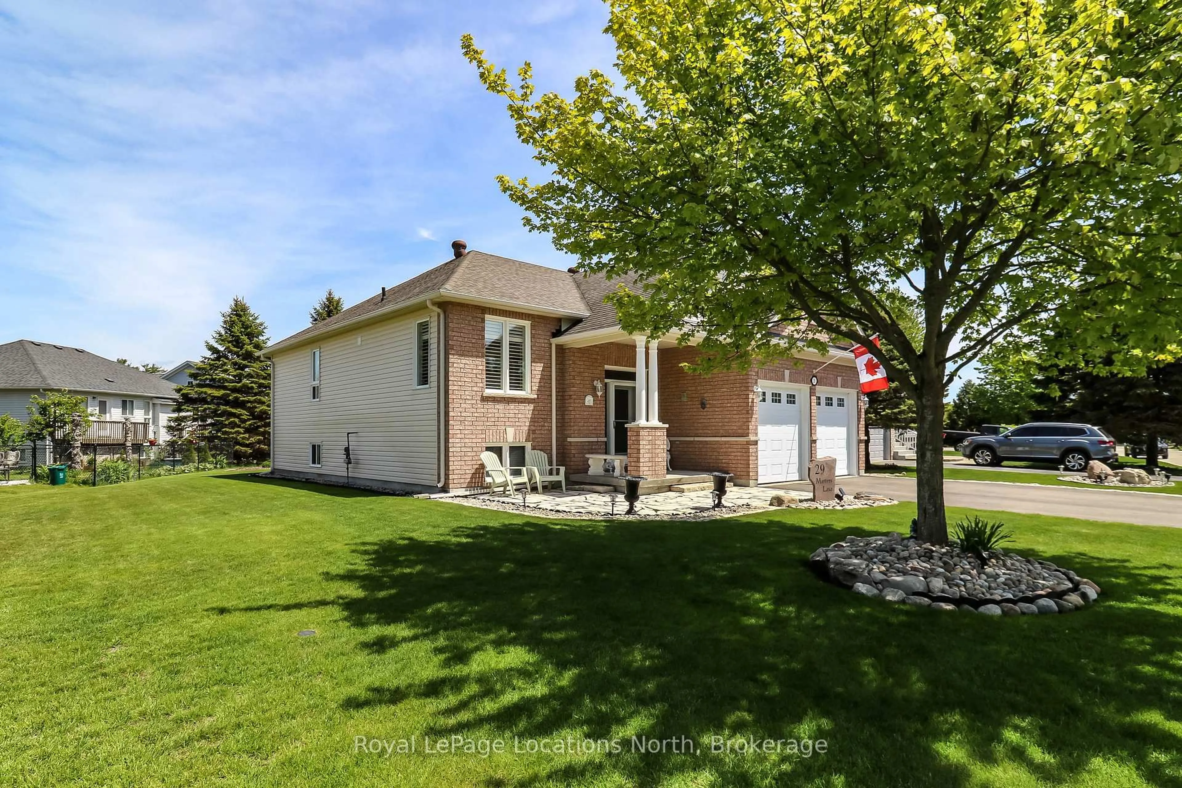Home with brick exterior material, street for 29 Masters Lane, Wasaga Beach Ontario L9Z 1S8