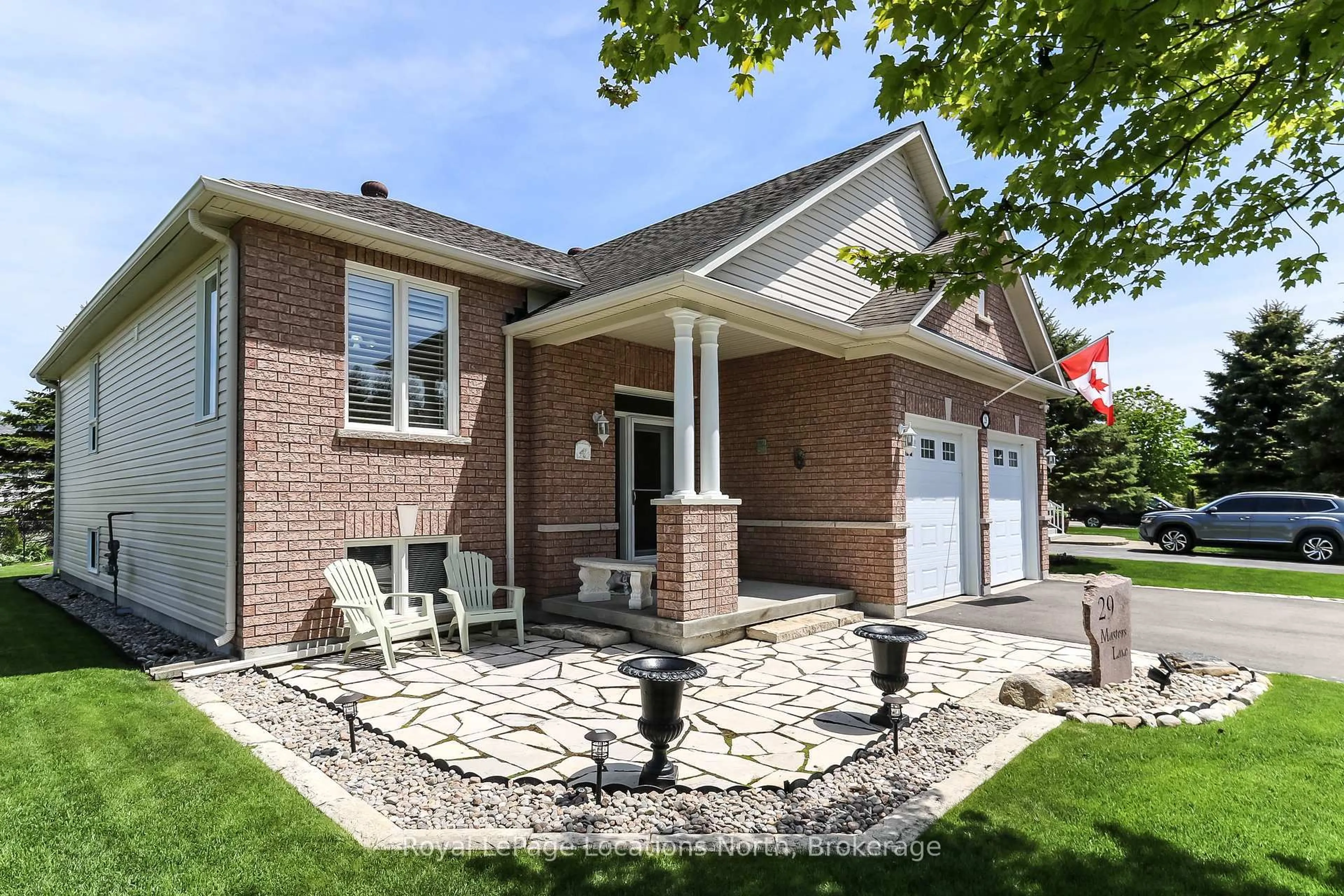 Home with brick exterior material, street for 29 Masters Lane, Wasaga Beach Ontario L9Z 1S8