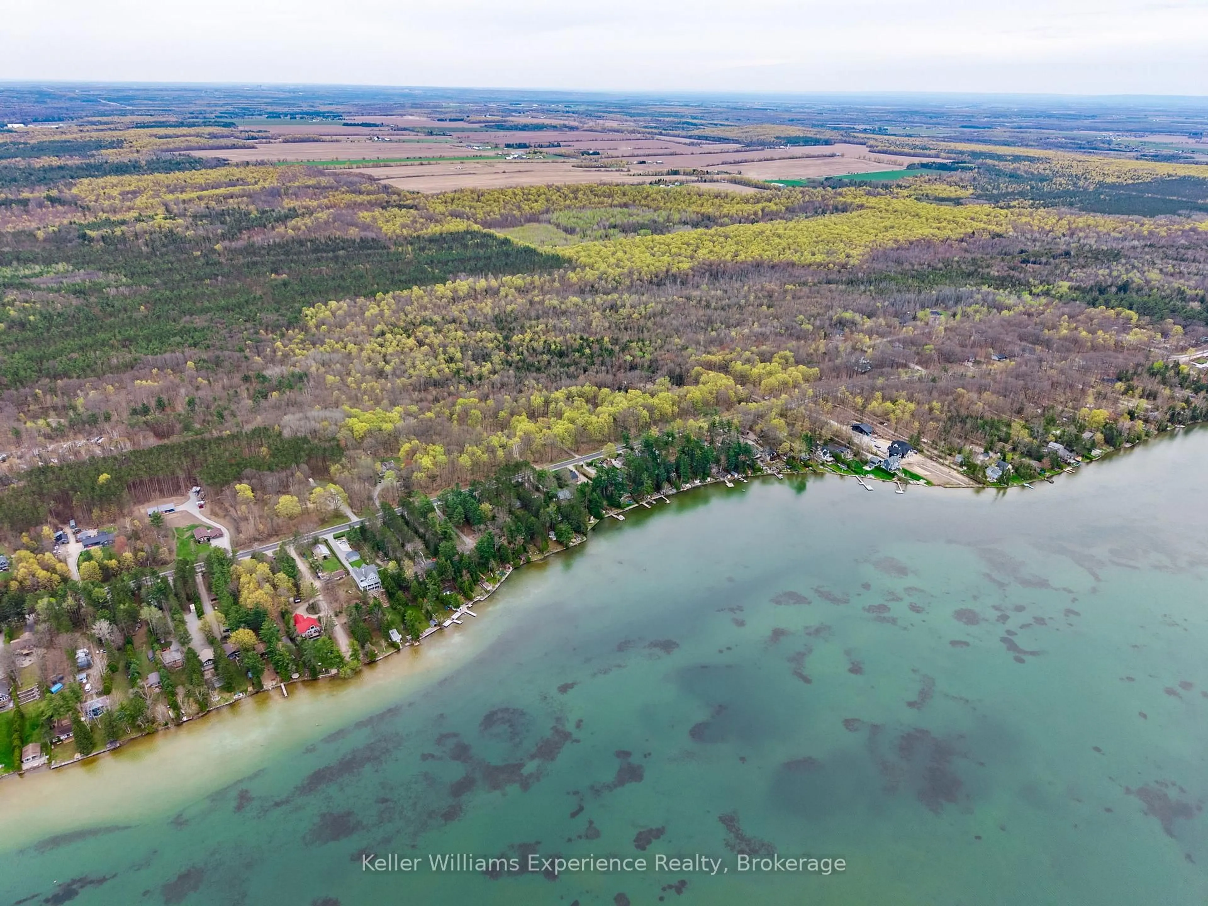 A pic from outside/outdoor area/front of a property/back of a property/a pic from drone, water/lake/river/ocean view for 2256 South Orr Lake Rd, Springwater Ontario L0L 1P0