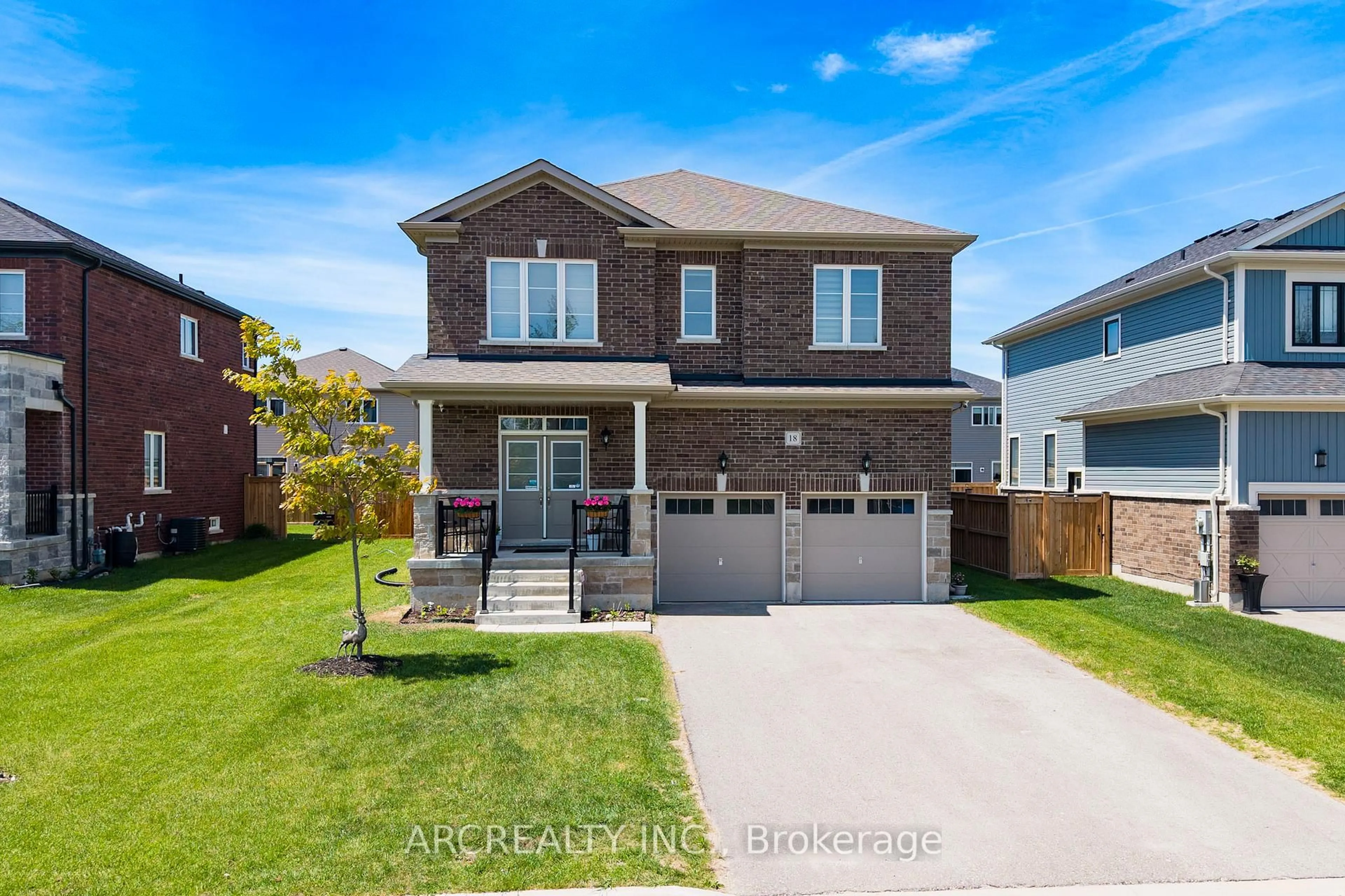Home with brick exterior material, street for 18 Emerald St, Wasaga Beach Ontario L9Z 0K8