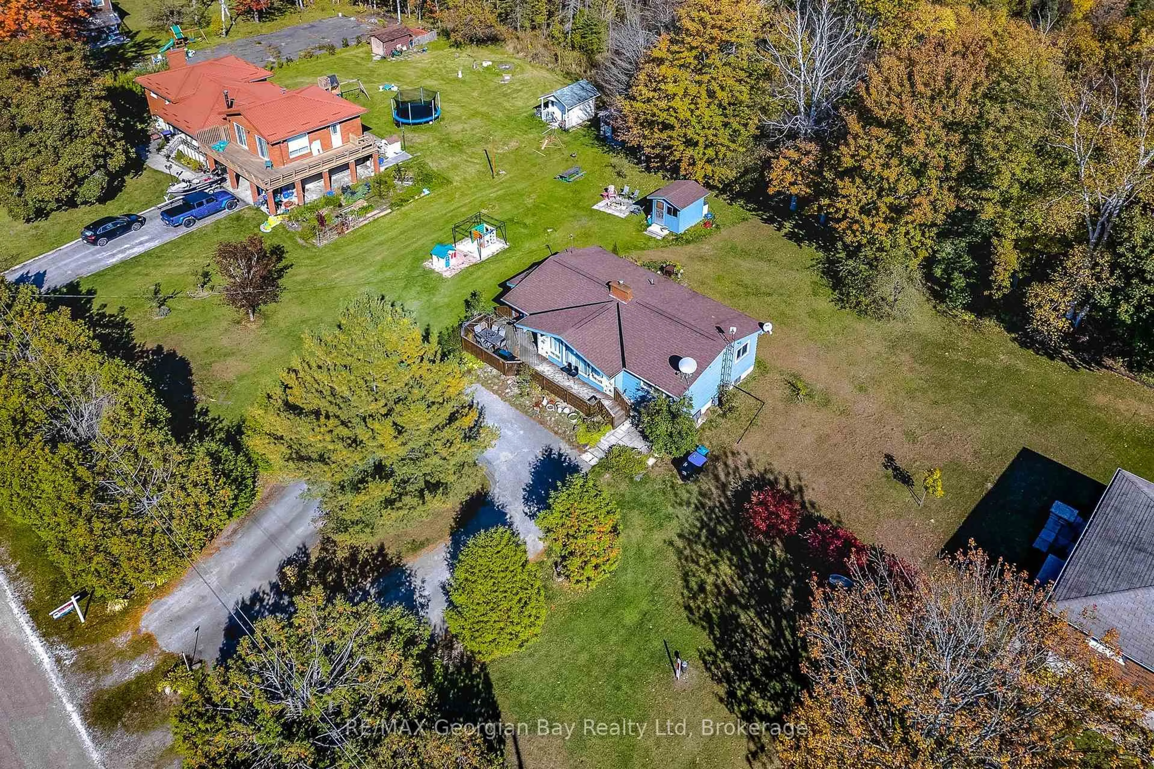 A pic from outside/outdoor area/front of a property/back of a property/a pic from drone, unknown for 69 Albert Ave, Tiny Ontario L0L 2J0
