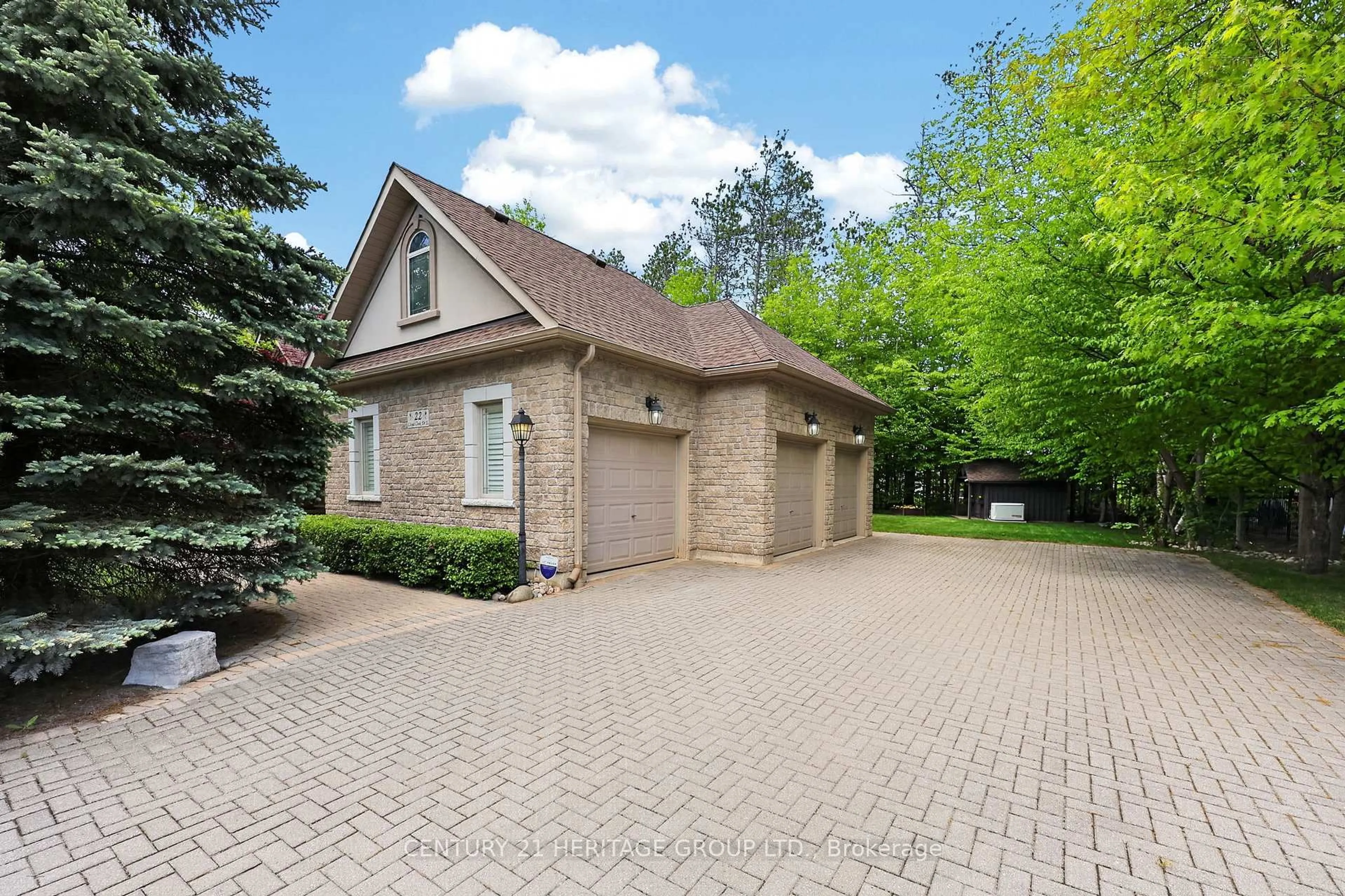 Home with brick exterior material, street for 22 Lloyd Cook Dr, Springwater Ontario L9X 0H5