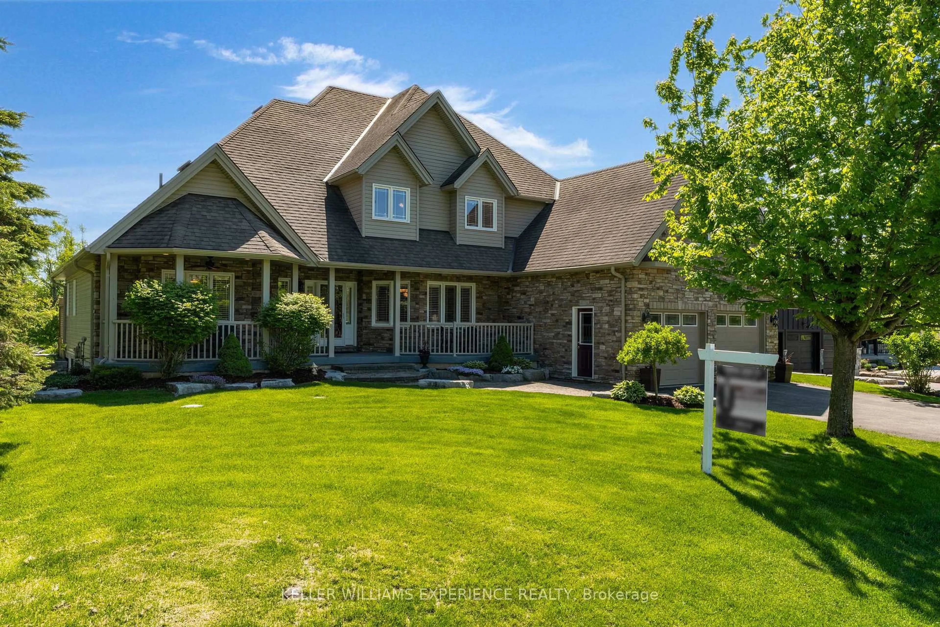 A pic from outside/outdoor area/front of a property/back of a property/a pic from drone, street for 61 Highland Dr, Oro-Medonte Ontario L0L 2L0