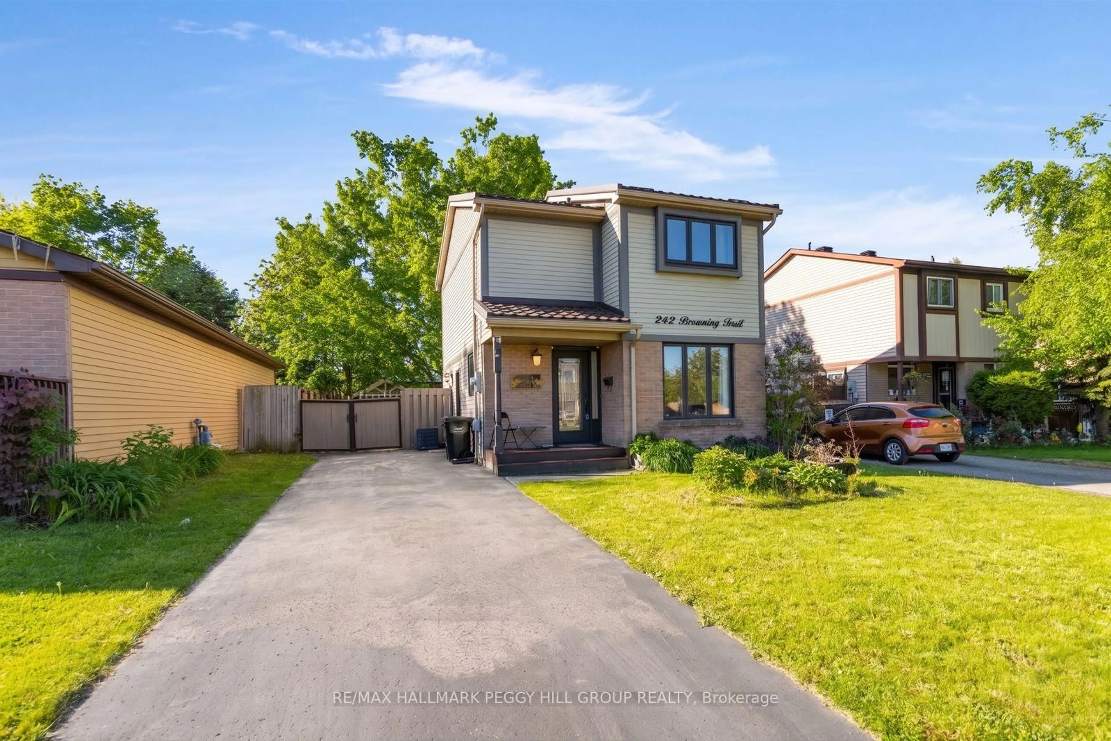 Home with brick exterior material, street for 242 Browning Tr, Barrie Ontario L4N 5C1