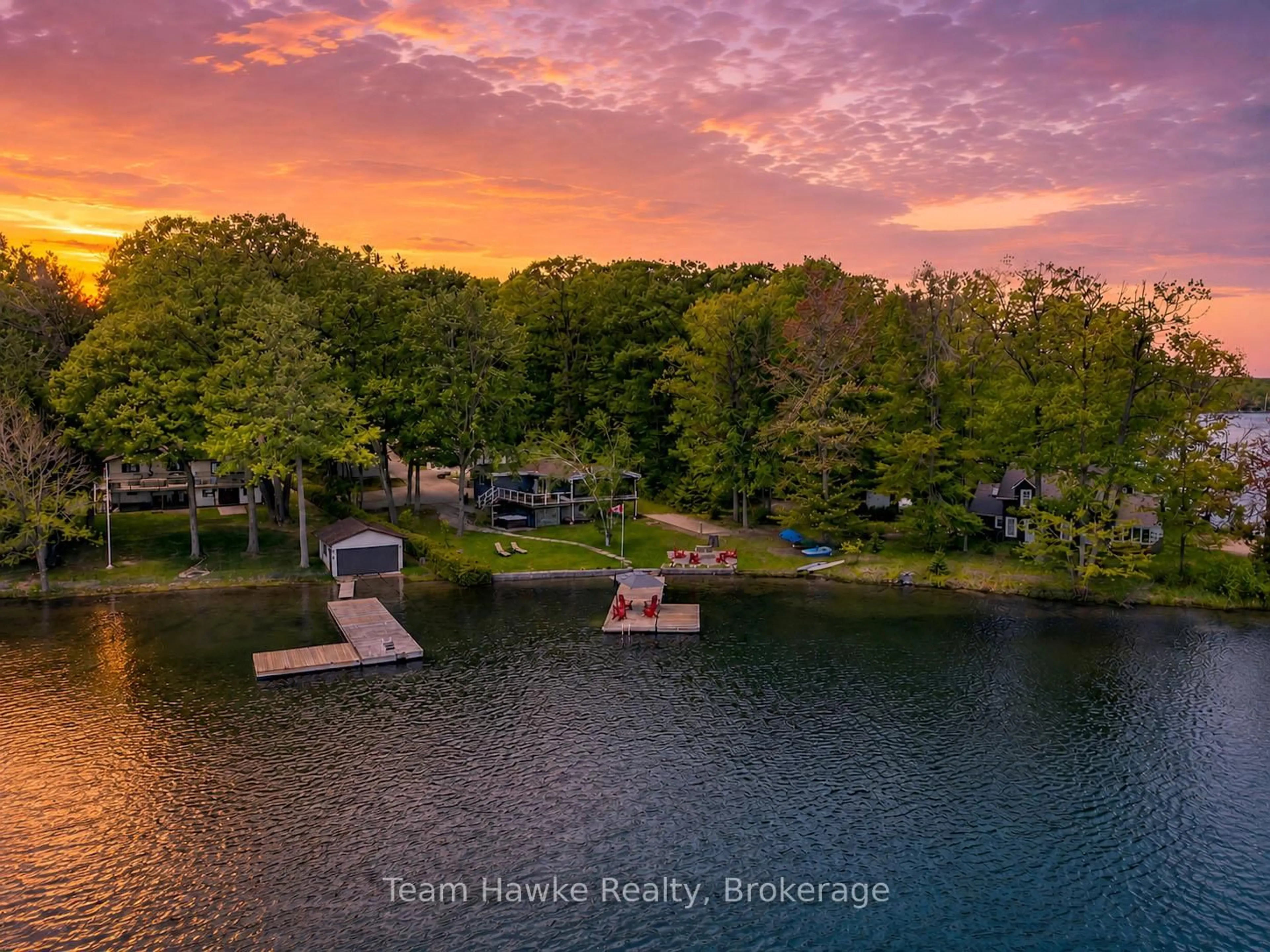 A pic from outside/outdoor area/front of a property/back of a property/a pic from drone, water/lake/river/ocean view for 23 Timcourt Dr, Tiny Ontario L9M 0B9