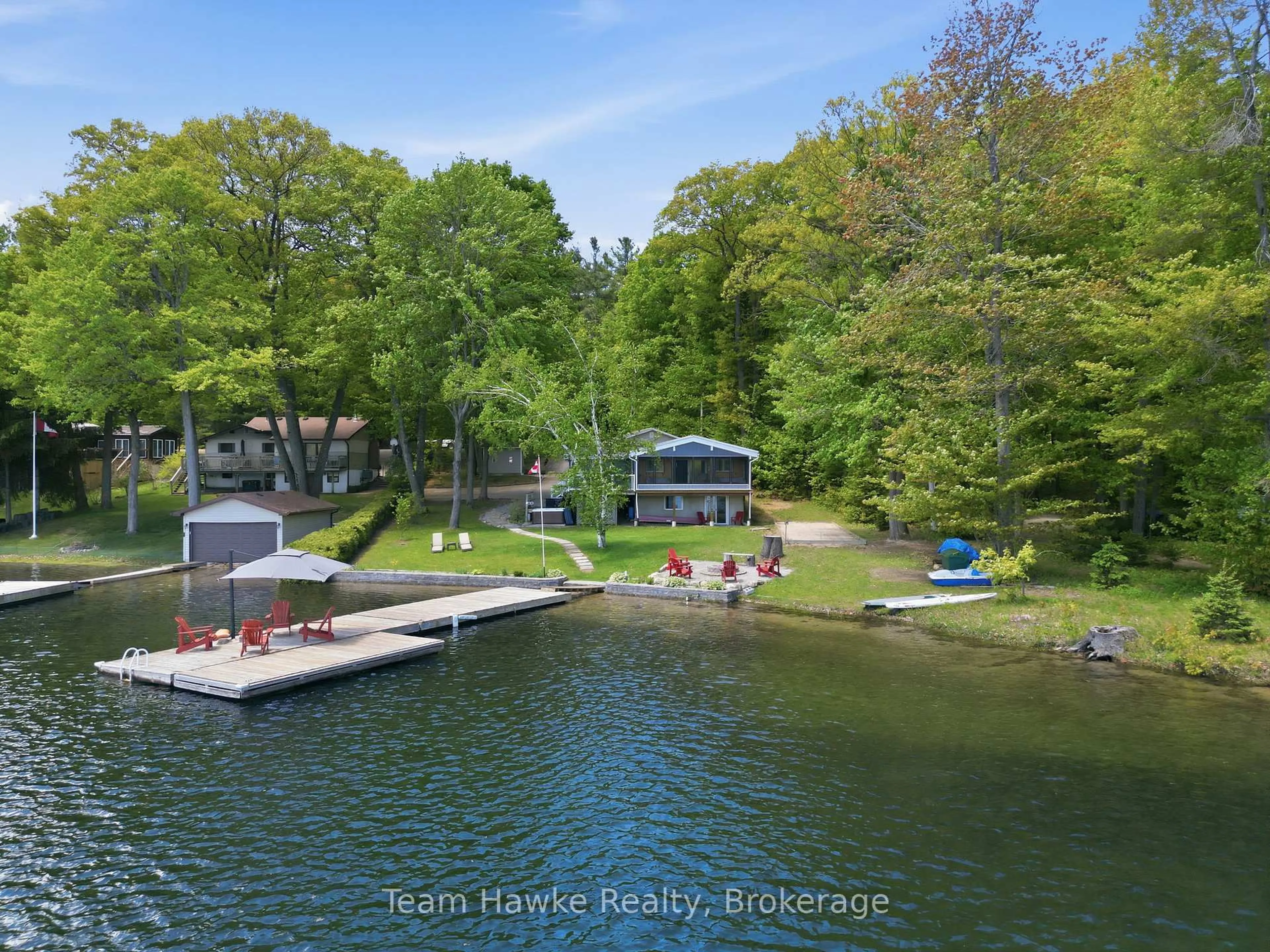 A pic from outside/outdoor area/front of a property/back of a property/a pic from drone, water/lake/river/ocean view for 23 Timcourt Dr, Tiny Ontario L9M 0B9
