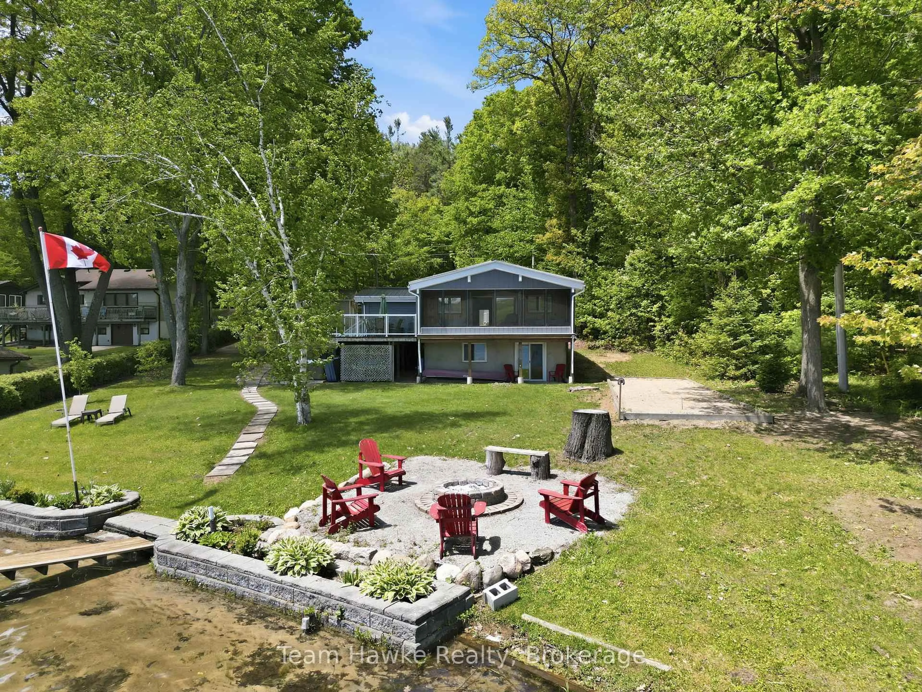 A pic from outside/outdoor area/front of a property/back of a property/a pic from drone, water/lake/river/ocean view for 23 Timcourt Dr, Tiny Ontario L9M 0B9