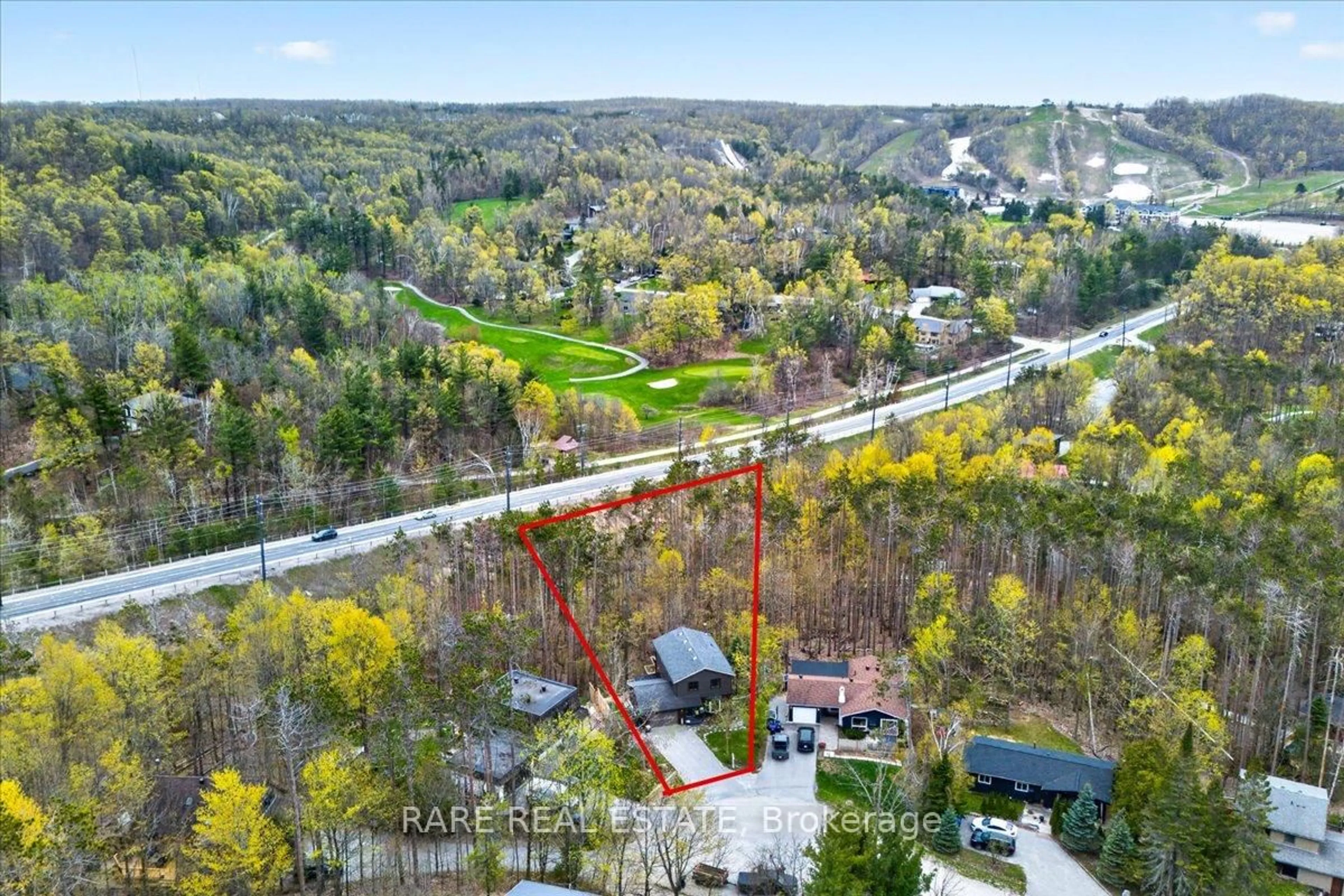 A pic from outside/outdoor area/front of a property/back of a property/a pic from drone, forest/trees view for 7 Pine Spring, Oro-Medonte Ontario L4M 4Y8