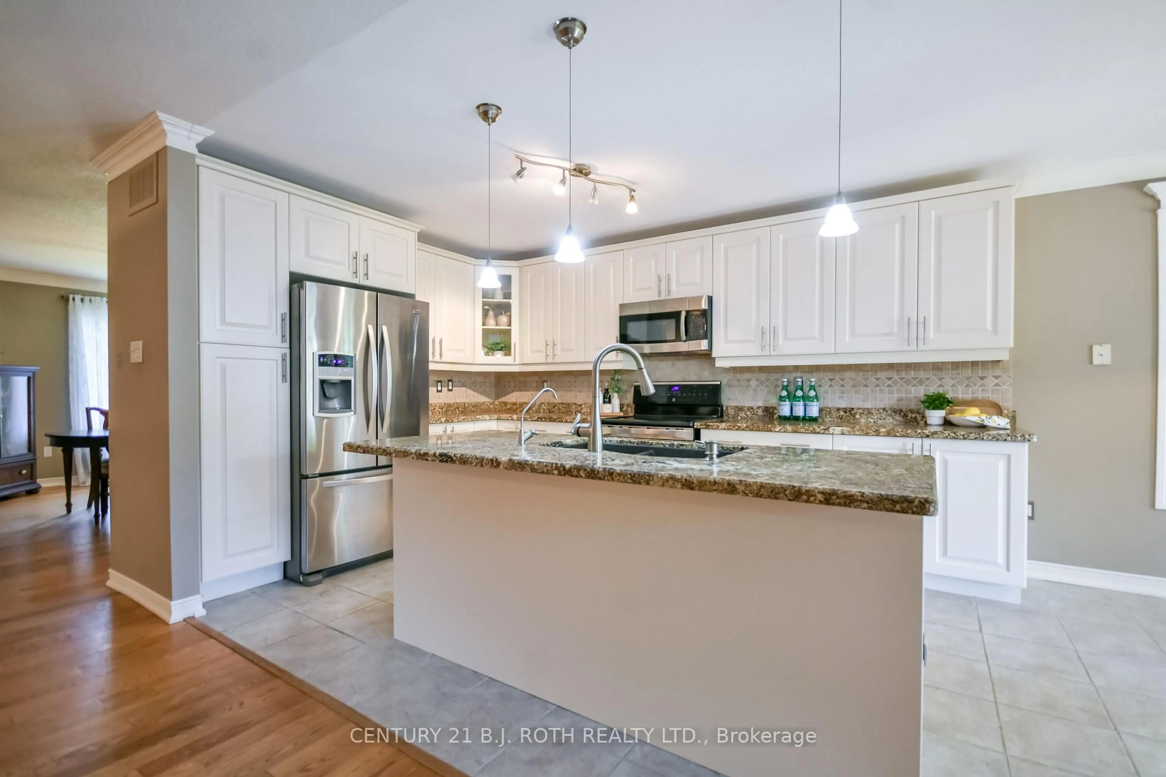 Open concept kitchen, ceramic/tile floor for 112 Silver Birch Ave, Wasaga Beach Ontario L9Z 1N2