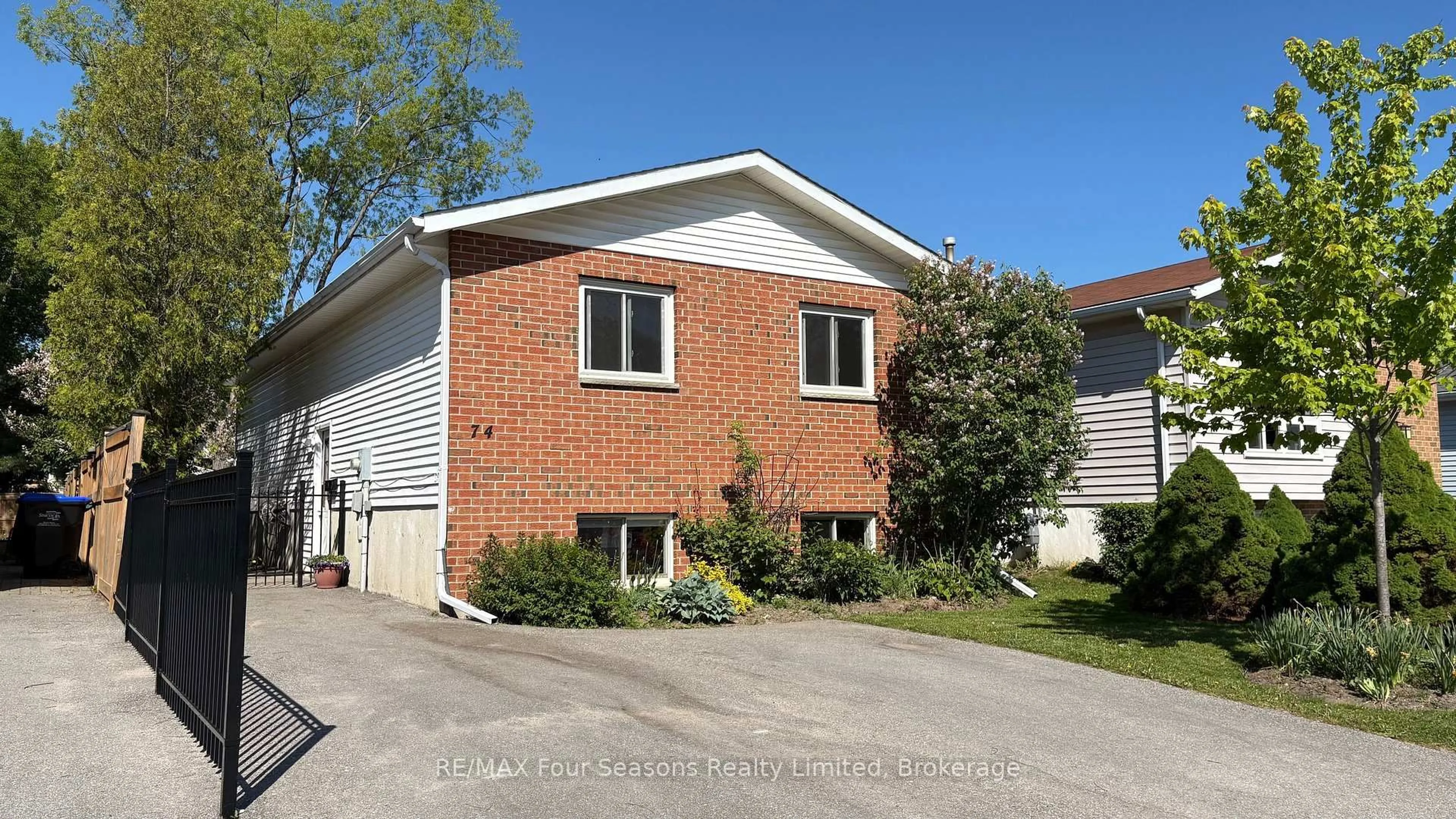 Home with brick exterior material, street for 74 Telfer Rd, Collingwood Ontario L9Y 4S2
