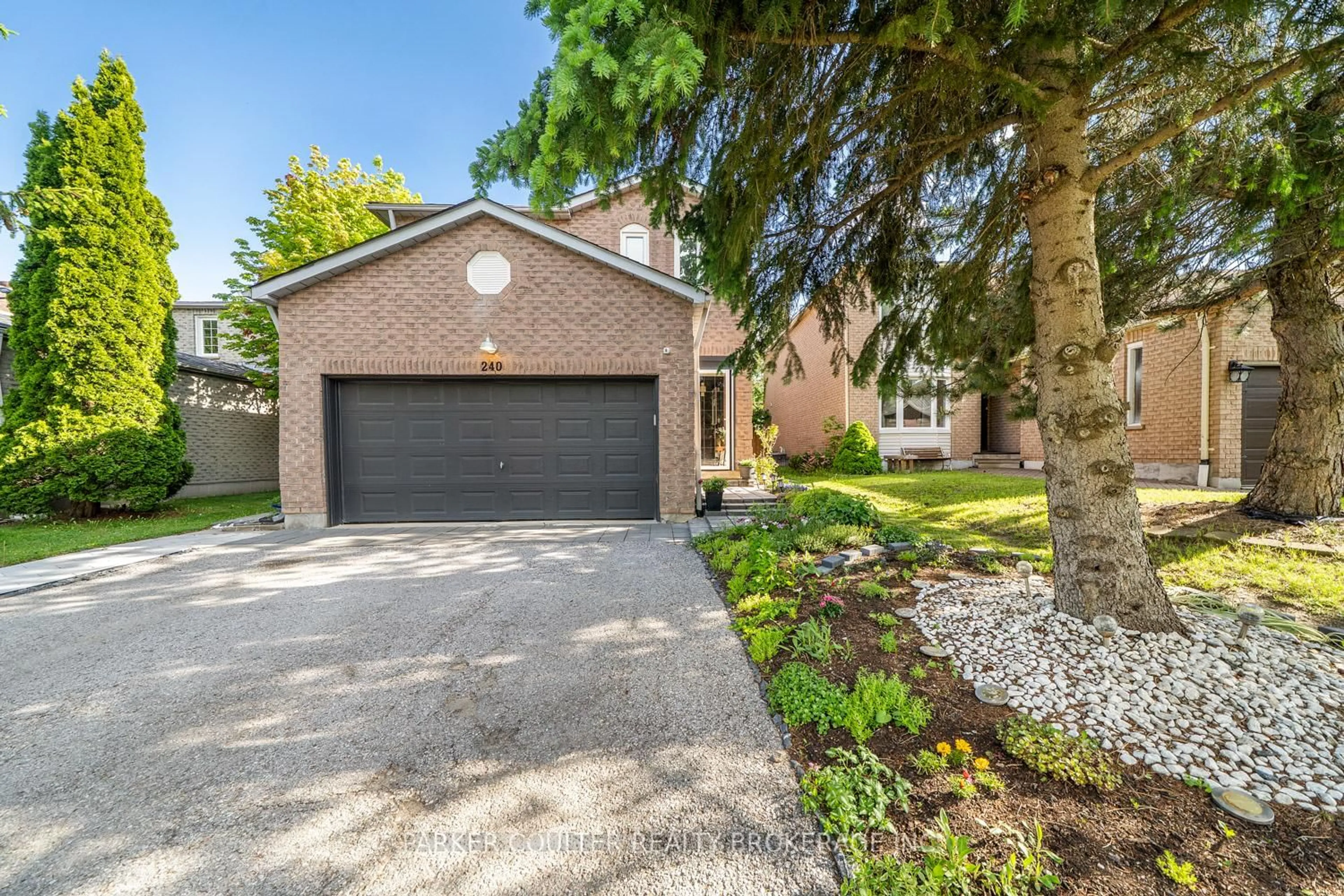 Home with brick exterior material, street for 240 Hickling Tr, Barrie Ontario L4M 5W5